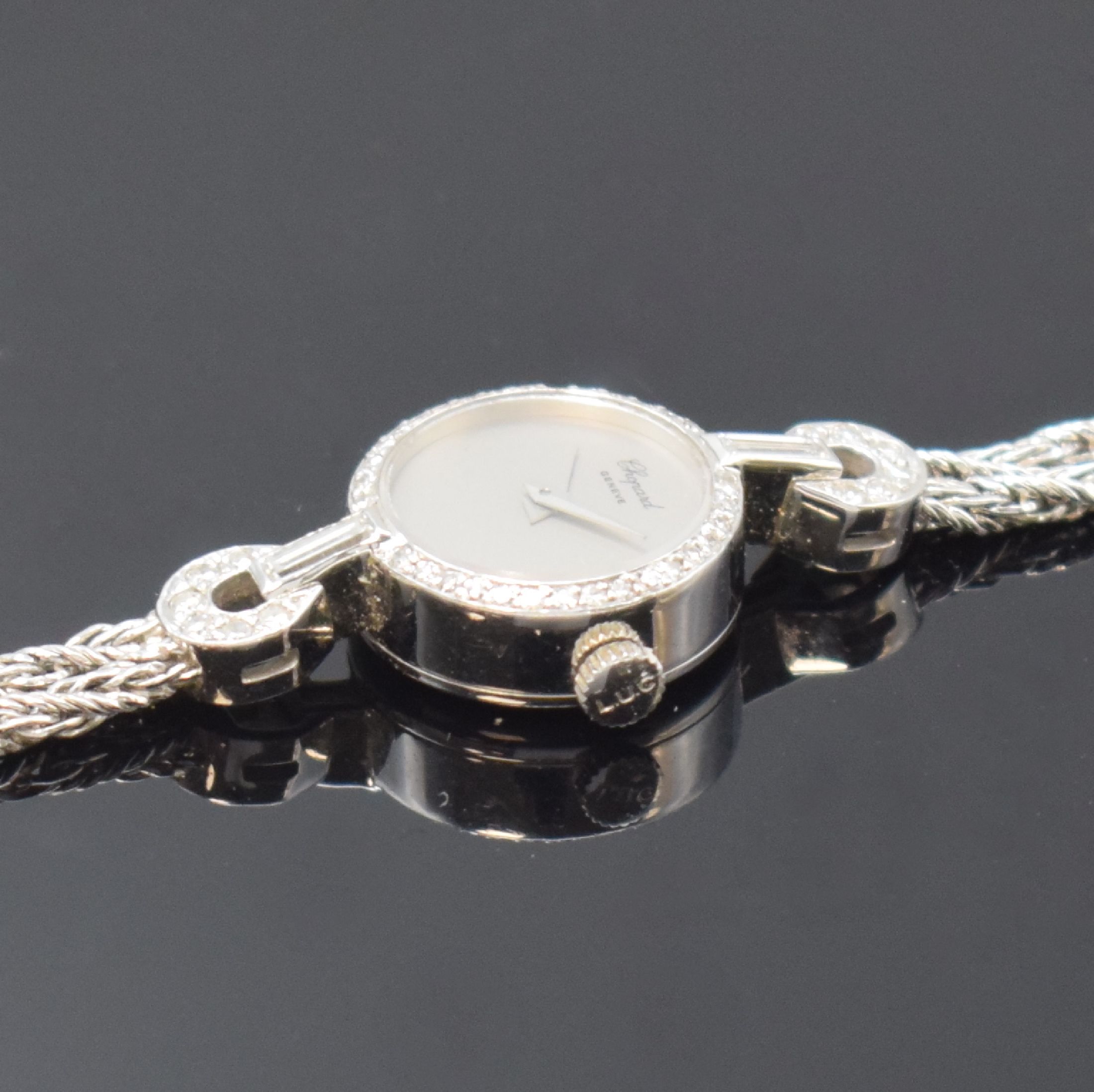 Detail c: CHOPARD Damenschmuckbanduhr in WG 750/000, Schweiz um 1975, Handaufzug, Lünette wie Bandansätze aufw. m. Diamanten bes., Boden aufgedr., verg. ...