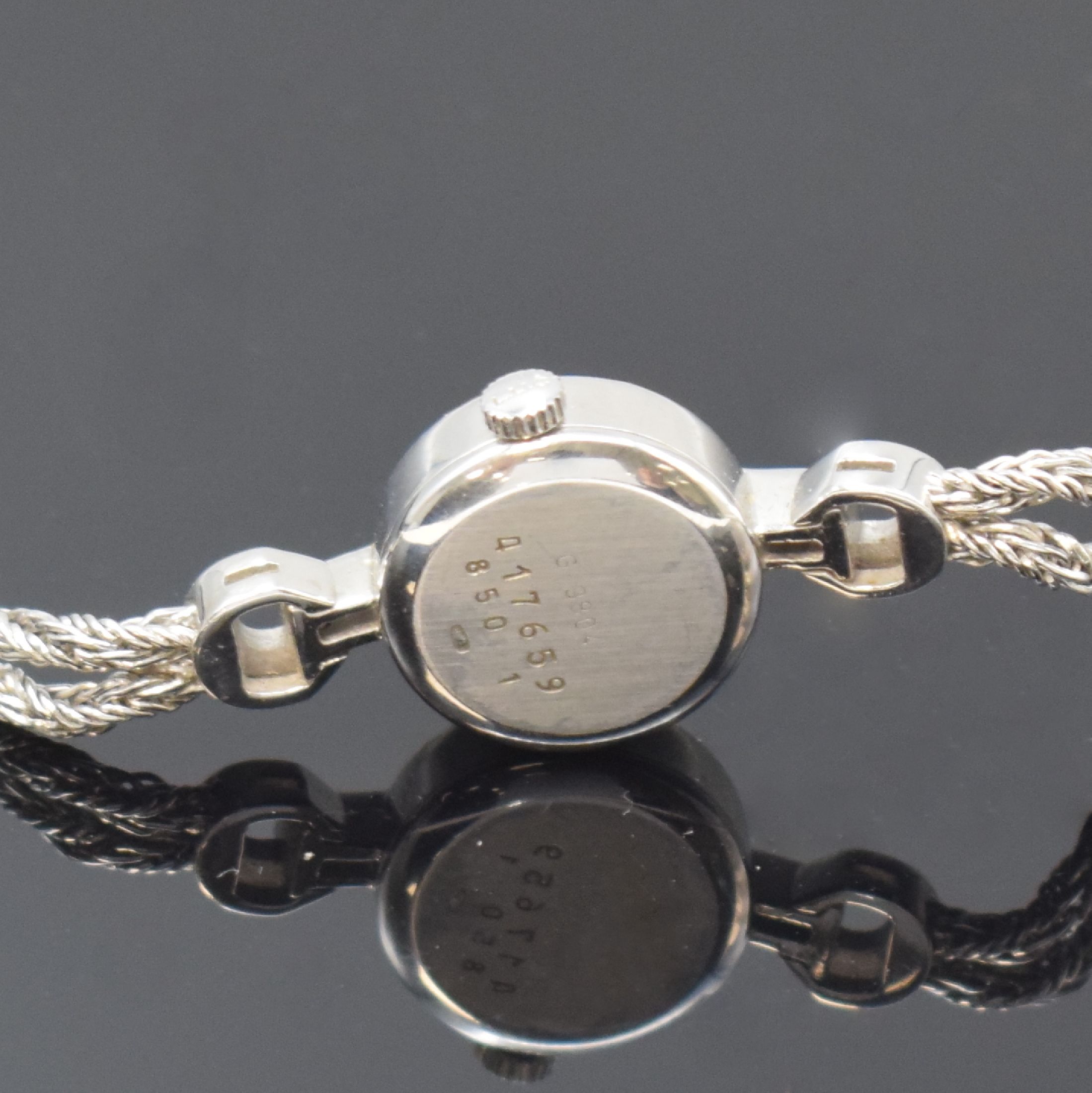 Detail d: CHOPARD Damenschmuckbanduhr in WG 750/000, Schweiz um 1975, Handaufzug, Lünette wie Bandansätze aufw. m. Diamanten bes., Boden aufgedr., verg. ...