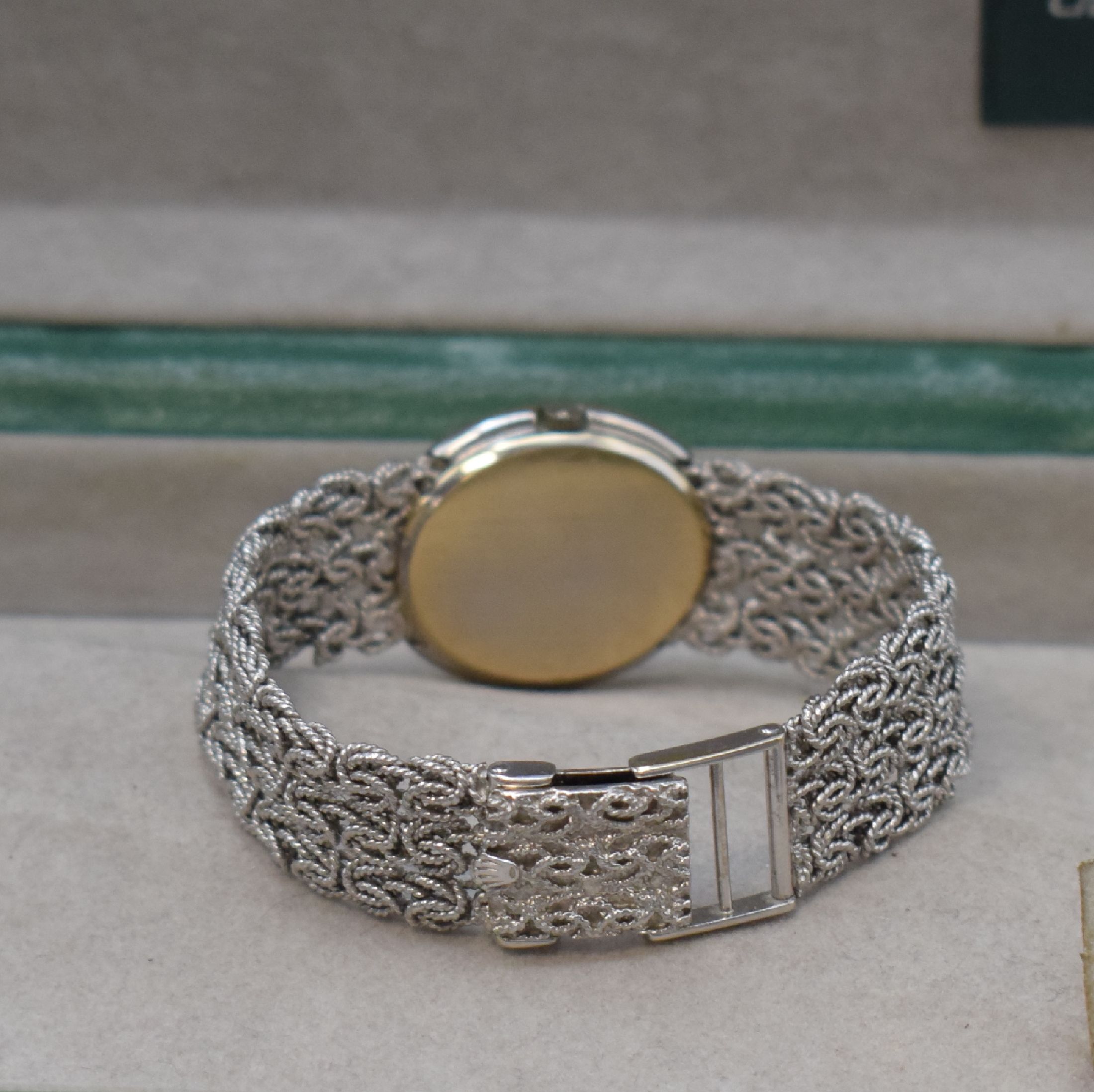 Detail b: ROLEX Cellini Damenarmbanduhr in WG 750/000, Schweiz 1970er Jahre, Handaufzug, Boden aufgedr., Kettenglieder-Band, silb. Zifferbl. m. aufges. ...