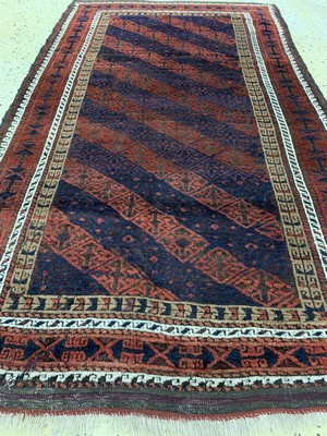 26723580d - Baloch antique, Persia, around 1900, Wolle aufWolle, approx. 180 x 105 cm, condition: 2-3 restauriert. Antique, old and decorative collector Orientalrugs, Carpets, Textiles and Flatweaves
