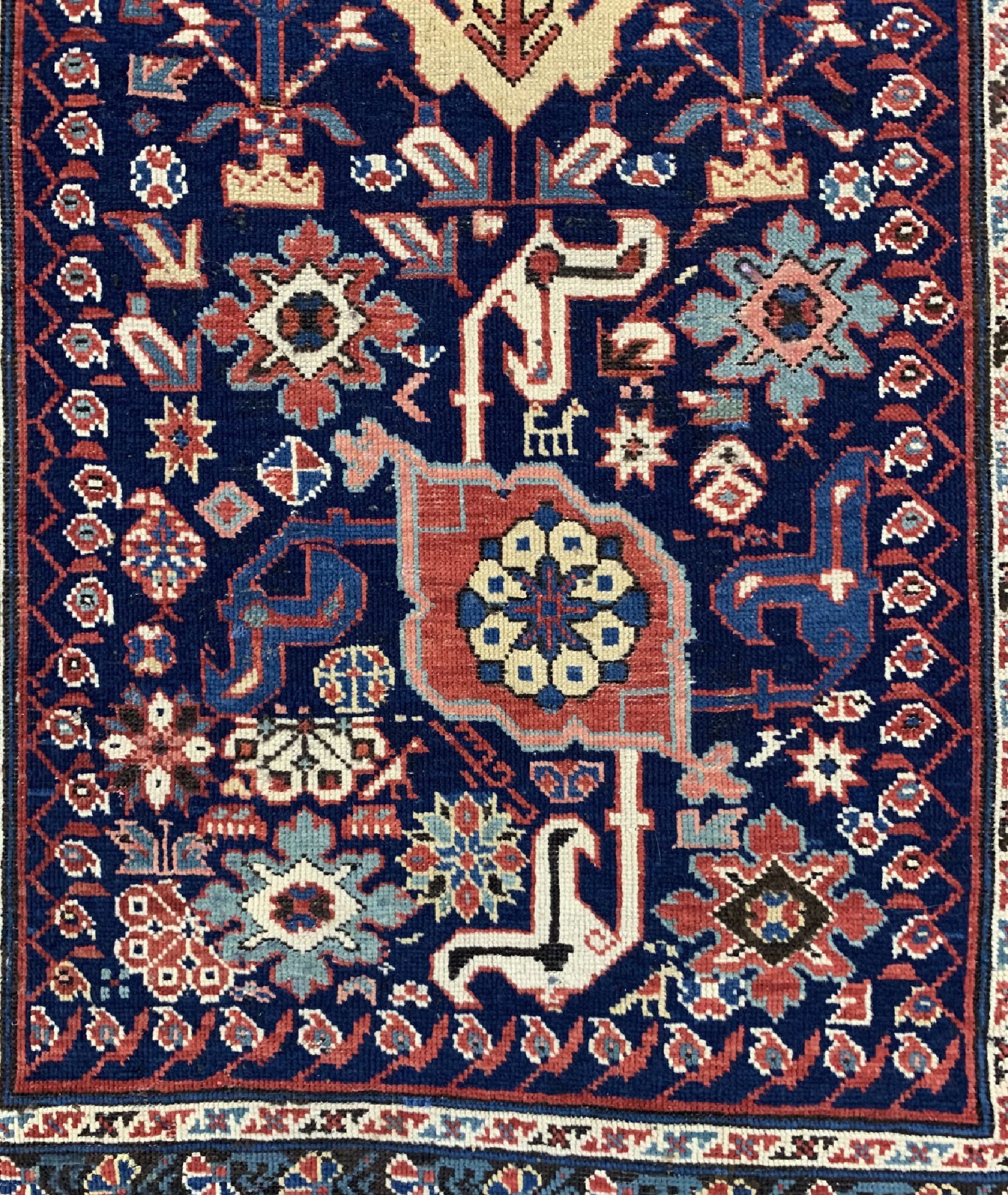 Detail b: Schirwan antik, Kaukasus, 19.Jhd, Wolle aufWolle, ca. 254 x 114 cm, EHZ: 2-3, restauriert