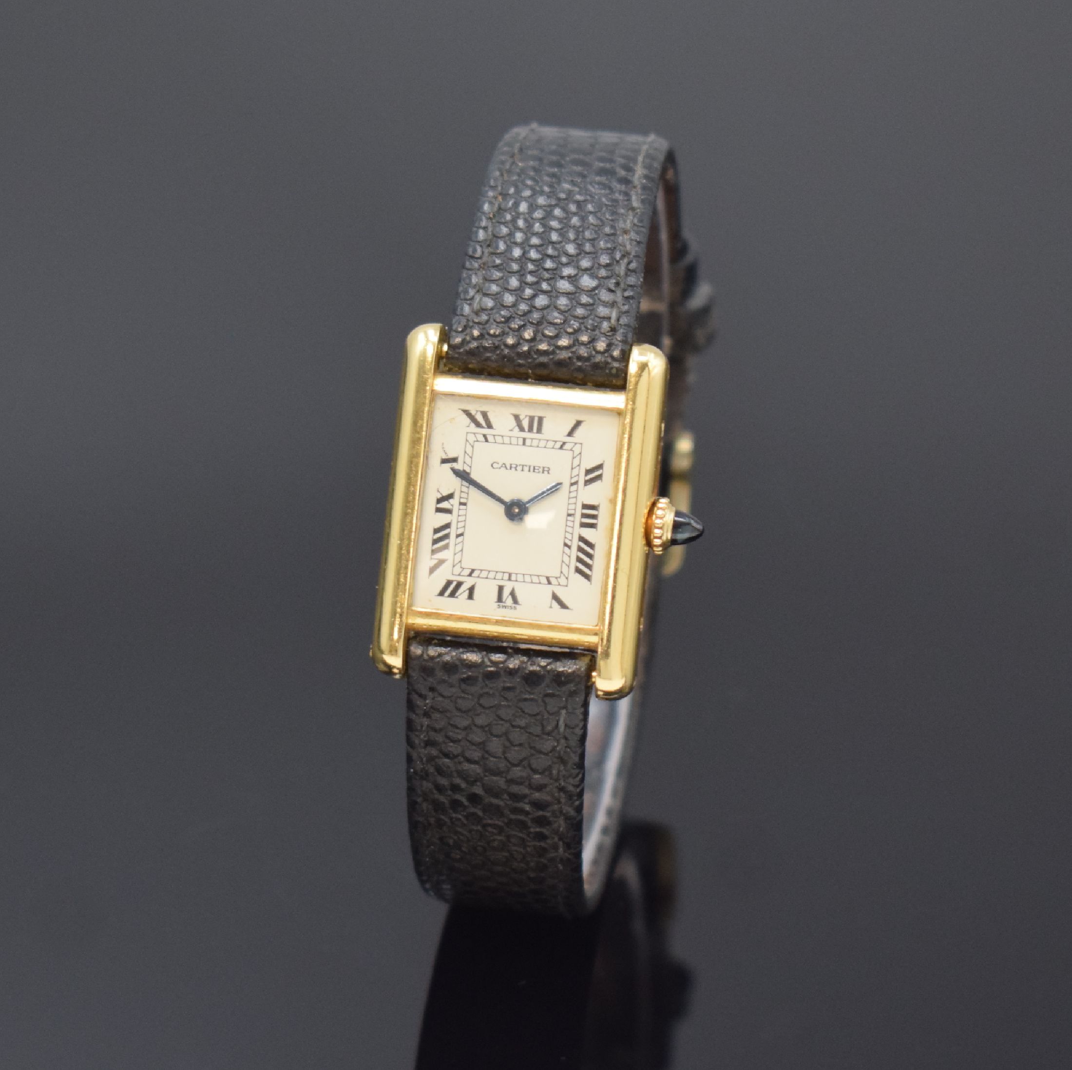 CARTIER Tank Damenarmbanduhr in GG 750/000, Schweiz um 1980, Handaufzug, rechteck. Geh., seitl. 4-fach verschr., Schmuckkrone, versilb. Zifferbl. m. ...