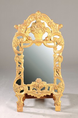 Image 26725036 - mirror, probably Italy, around 1780, wood opulent carved with flower baskets and wine leaves, gilt, Mirror partly corr., formerly loosely attached, approx. 90x46cm