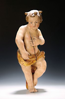 Image 26725066 - Putto, southern German, 2nd half of the 18th century, carved lime wood and painted in polychrome, stress crack, traces of age, length approx. 53cm