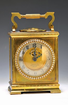Image 26725078 - Table clock, France, around 1900, brass case in the style of the Anglaise Clock, Carriage Clock Case Style, display of compass and thermometer (in ring form) under the handle, bezel set with rhinestones, silver-plated dialring, visible balance (cylinder gear), seller's signature Bordoli, Bologna, large round brass plate movement, France, ext. Elevator (keys don't fit), speed control, backcover doesn't close, height with handle approx. 20cm, condition of movement/housing 2 -3