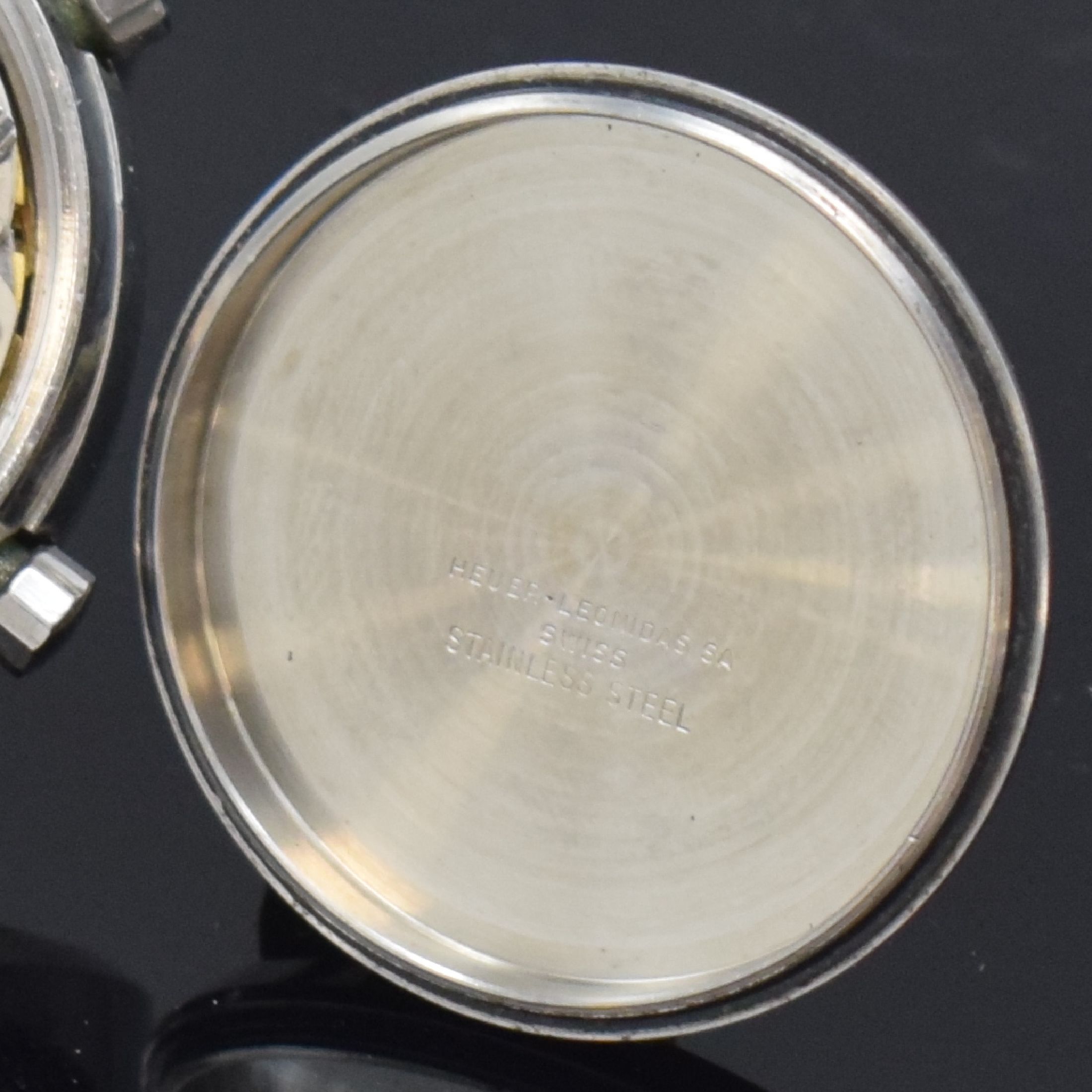 Detail e: HEUER Armbandchronograph Carrera Referenz 150.573 B, Automatik, Schweiz um 1974, verschr. Edelstahlgeh. inkl. orig. Gliederband m. Faltschl., orig. ...