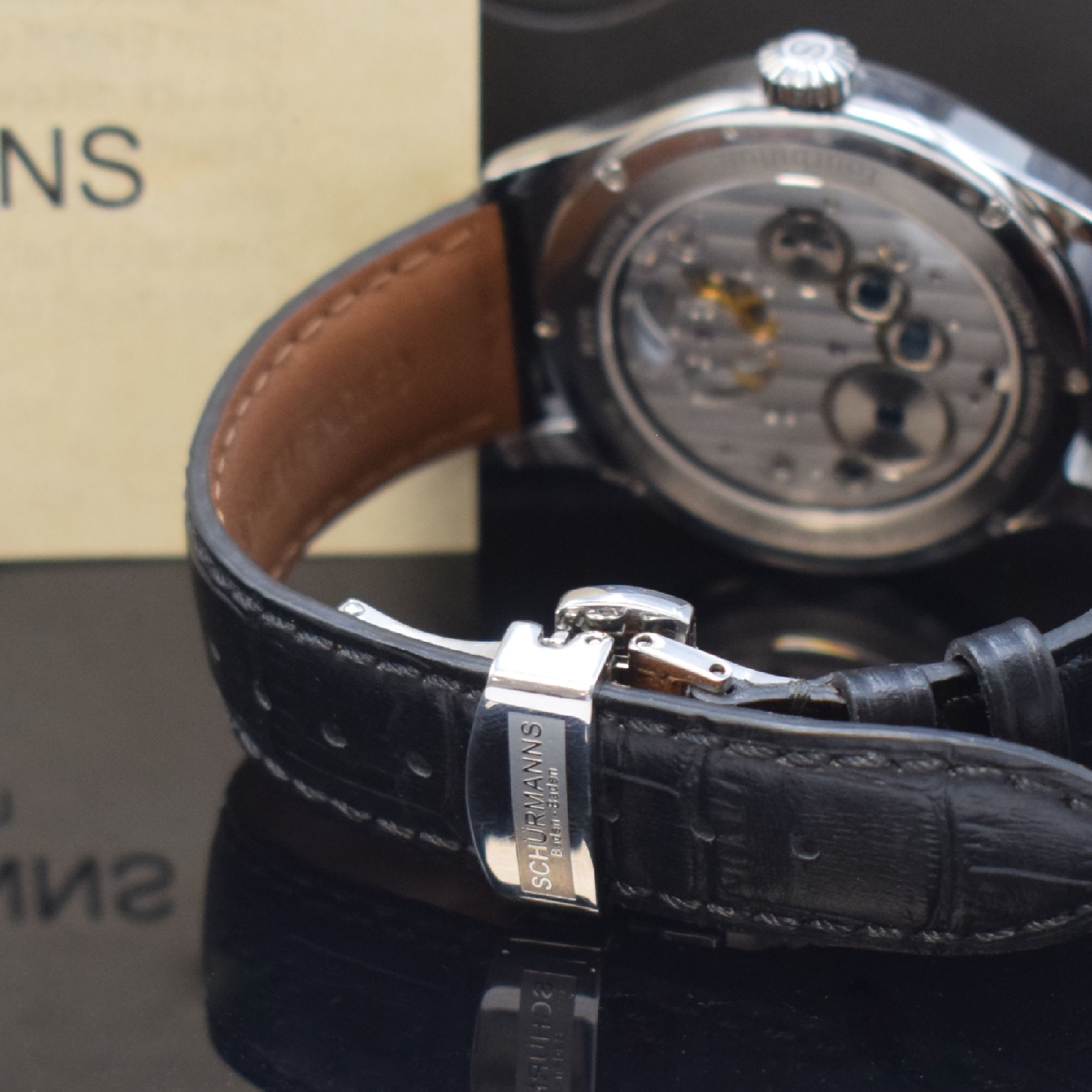 Detail b: SCHÜRMANNS Baden Baden Tourbillon Herrenarmbanduhr in Stahl, Deutschland verk. lt. beil. Garantie 06/2021, Handaufzug, beids. vergl. Geh. inkl. ...