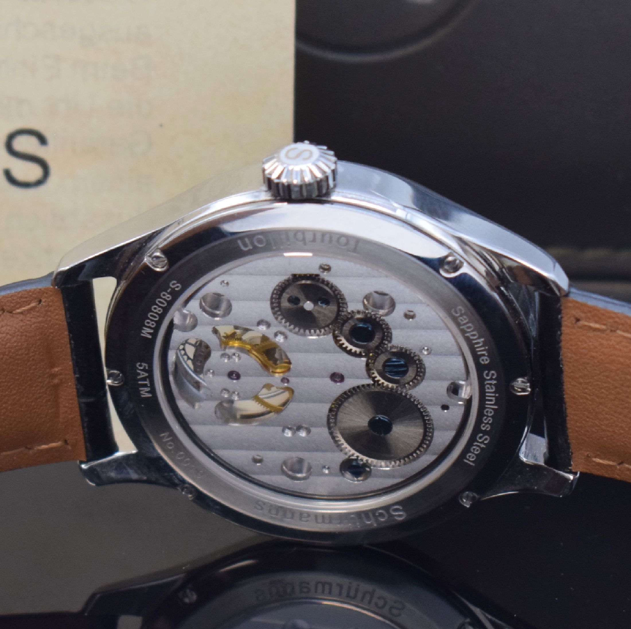 Detail d: SCHÜRMANNS Baden Baden Tourbillon Herrenarmbanduhr in Stahl, Deutschland verk. lt. beil. Garantie 06/2021, Handaufzug, beids. vergl. Geh. inkl. ...