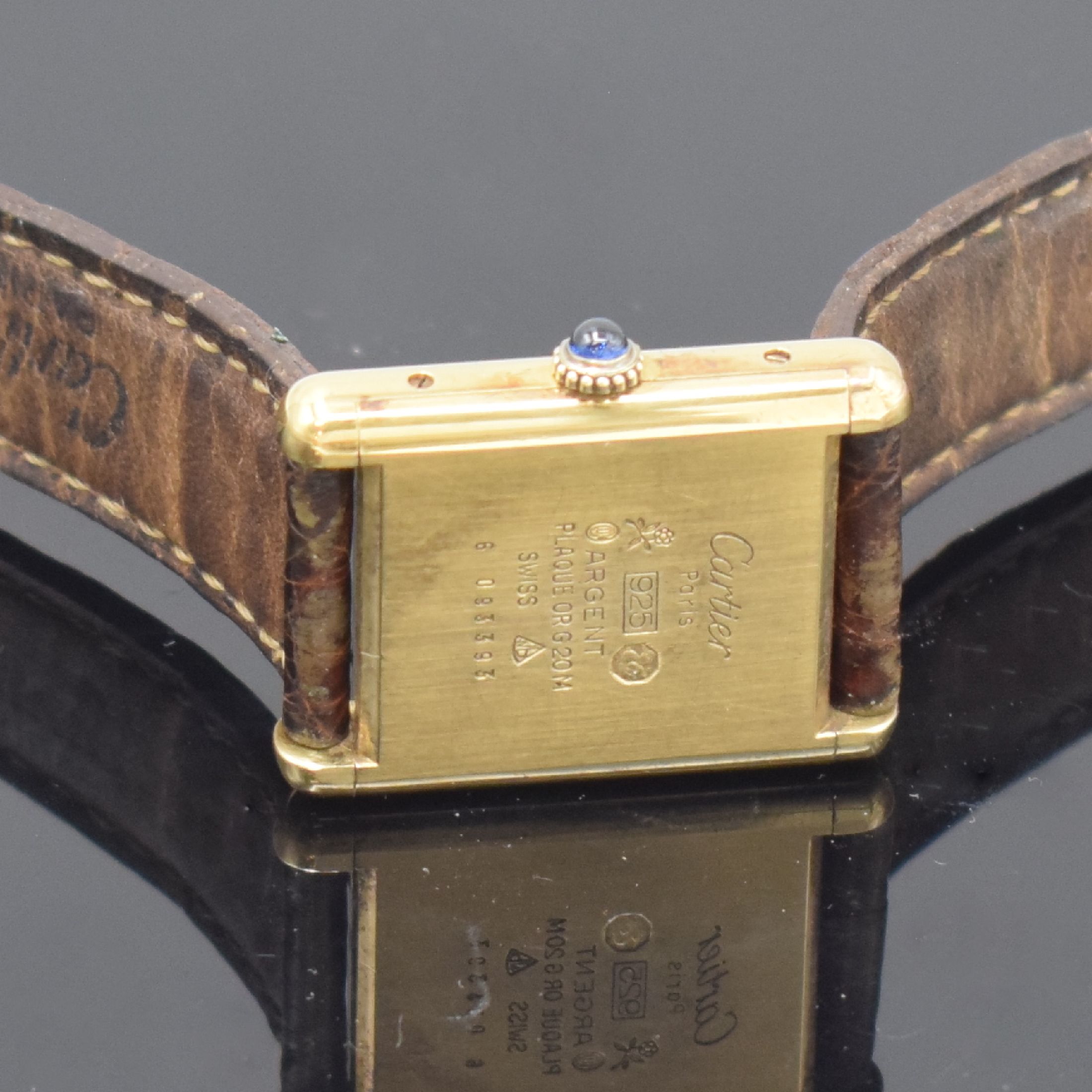Detail d: CARTIER Damenarmbanduhr Modellserie Tank, Handaufzug, Schweiz um 1980, verg. Sterlingsilbergeh. inkl. orig. Lederband m. verg. Dornschl., Boden ...
