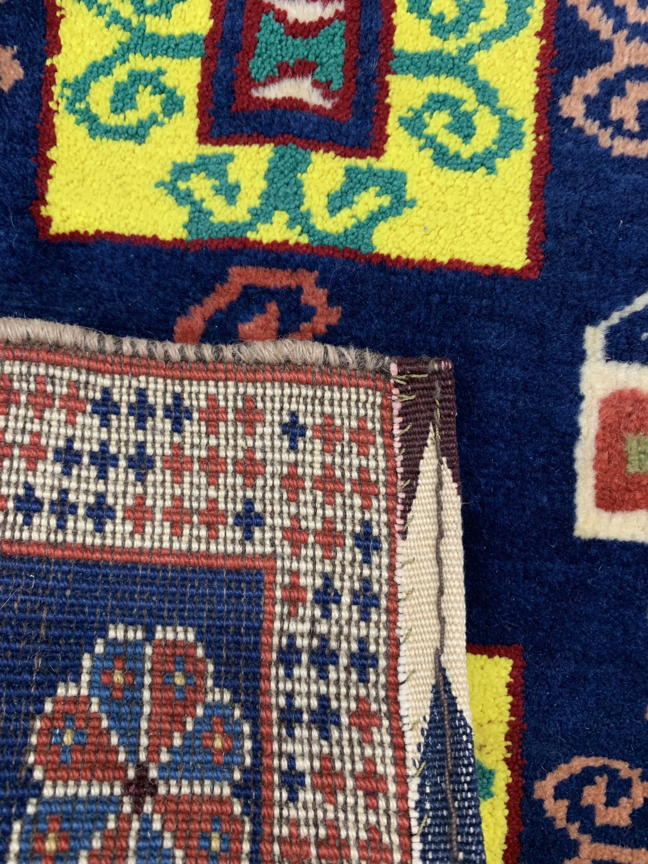 Detail d: Konvolut aus 8 Poschti & Taschenfront, Persien, um 1920/1940, Wolle auf Wolle & Baumwolle, ca. 60 x 55 cm, EHZ: 3