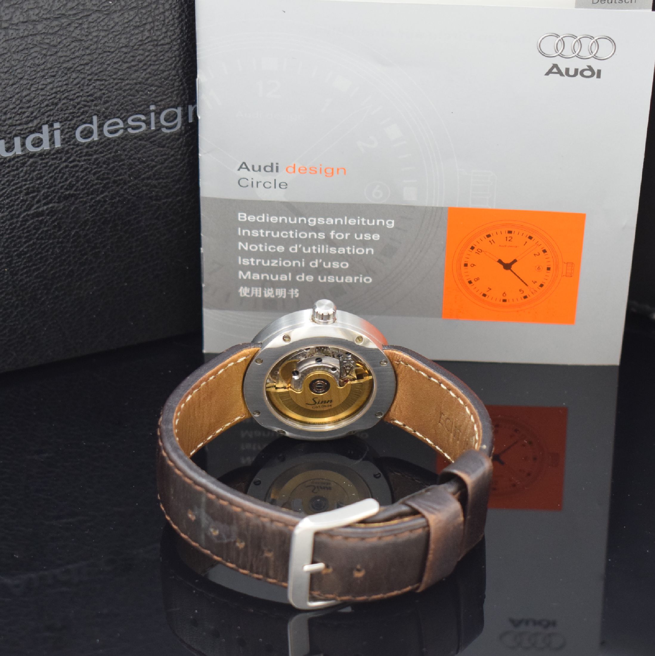 Detail d: SINN / AUDI design Herrenarmbanduhr in Stahl, Automatik, beids. verg., Boden 8-fach verschr., schwarzes Kontrastzifferbl., Anz. v. Std., Min., ...