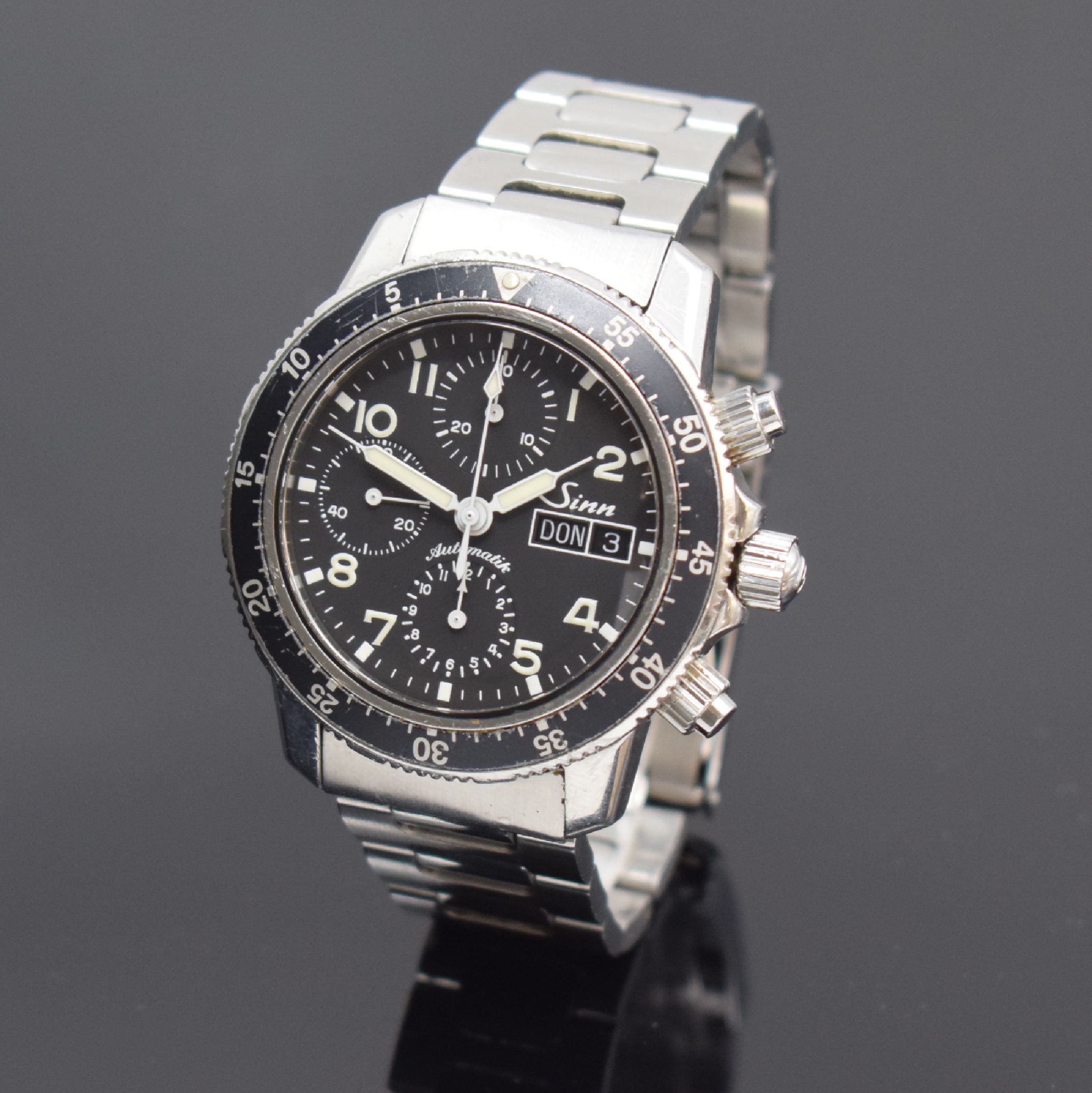 SINN Herrenarmbanduhr mit Chronograph Referenz 103, Automatik, Deutschland um 2003, verschr. Edelstahlgeh. inkl. orig. Gliederband m. Faltschl., ...