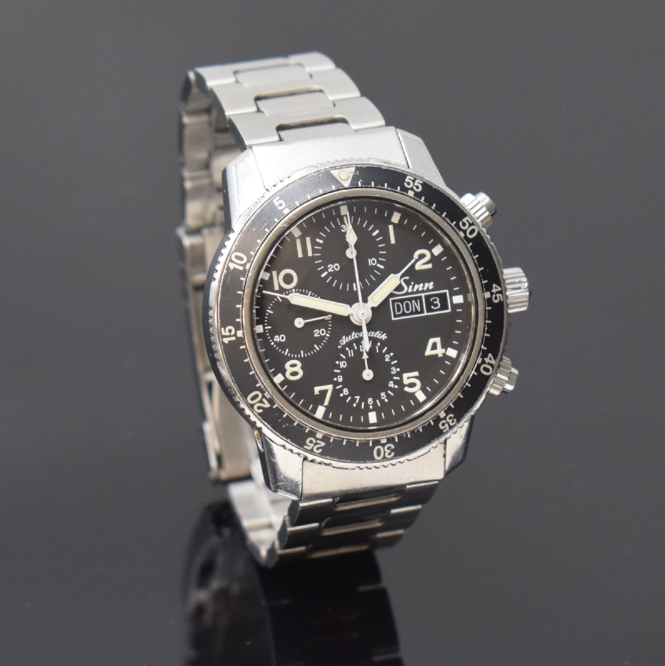 Detail b: SINN Herrenarmbanduhr mit Chronograph Referenz 103, Automatik, Deutschland um 2003, verschr. Edelstahlgeh. inkl. orig. Gliederband m. Faltschl., ...