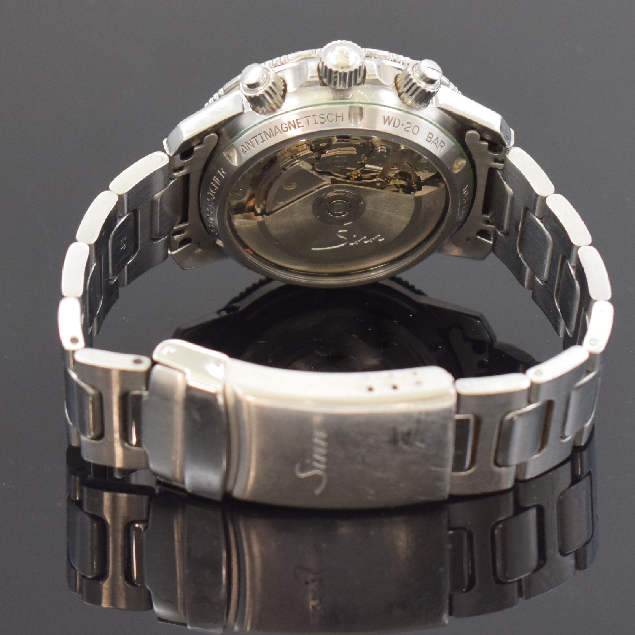 Detail d: SINN Herrenarmbanduhr mit Chronograph Referenz 103, Automatik, Deutschland um 2003, verschr. Edelstahlgeh. inkl. orig. Gliederband m. Faltschl., ...