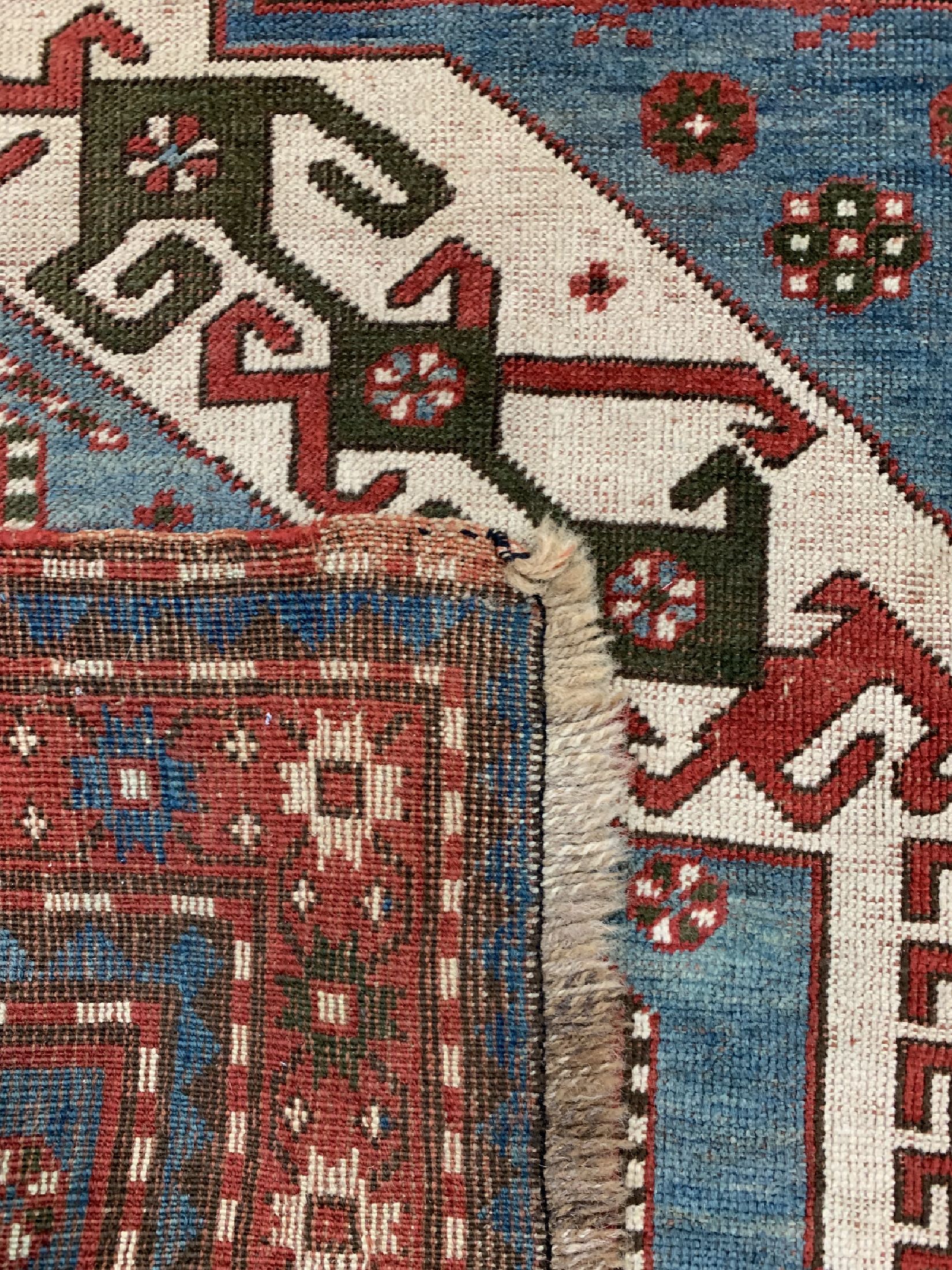 Detail e: Kazak"Kasim-Ushak" antik, Kaukasus, 19.Jhd,Wolle auf Wolle, ca. 230 x 160 cm, EHZ: 3(restauriert)