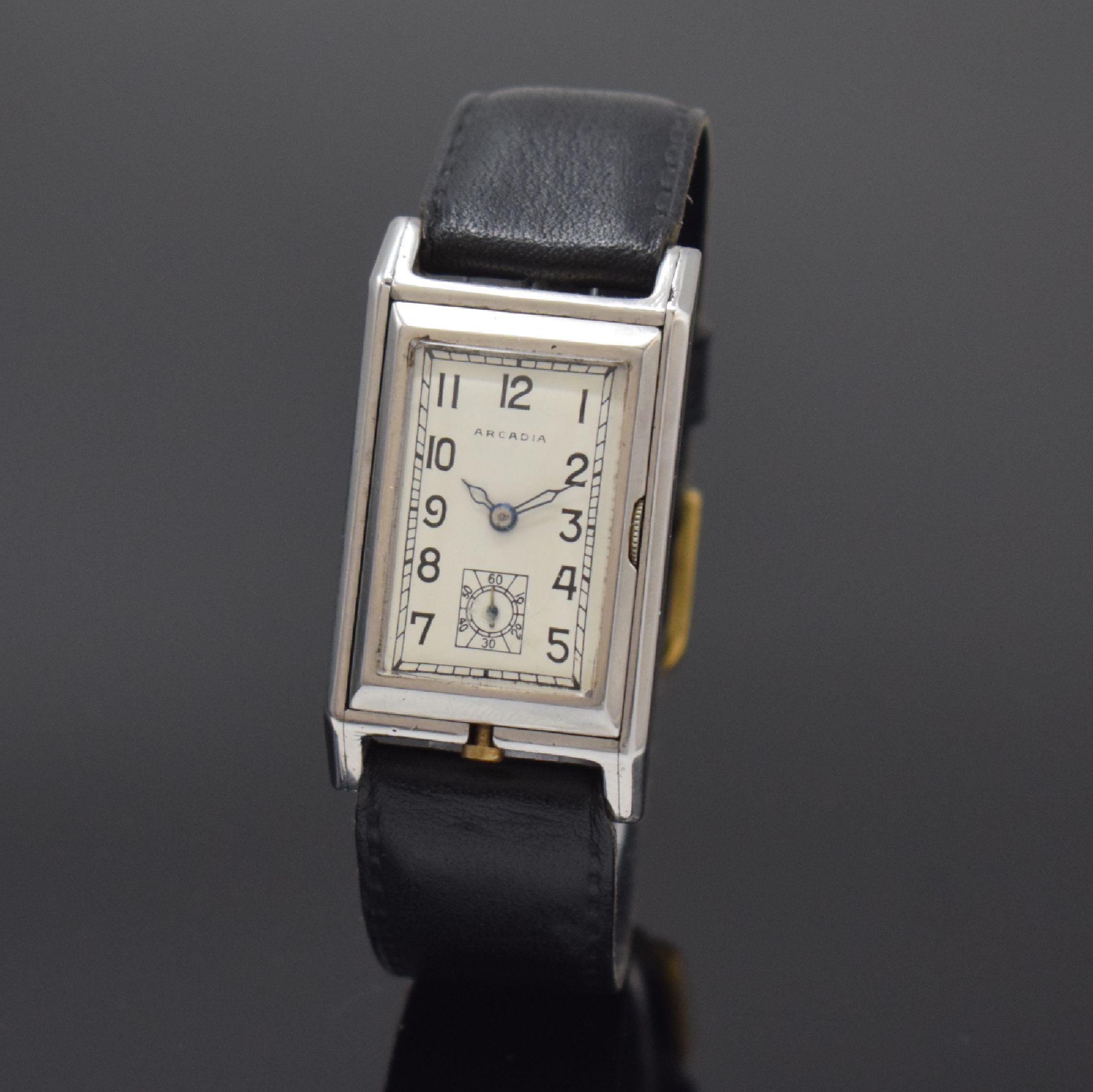 ARCADIA seltene frühe Wende-Armbanduhr in Stahl, Schweiz um 1940, Handaufzug, rechteck. Geh., im Innenteil in der 12/6-Achse um 180 Grad zu drehen, ...