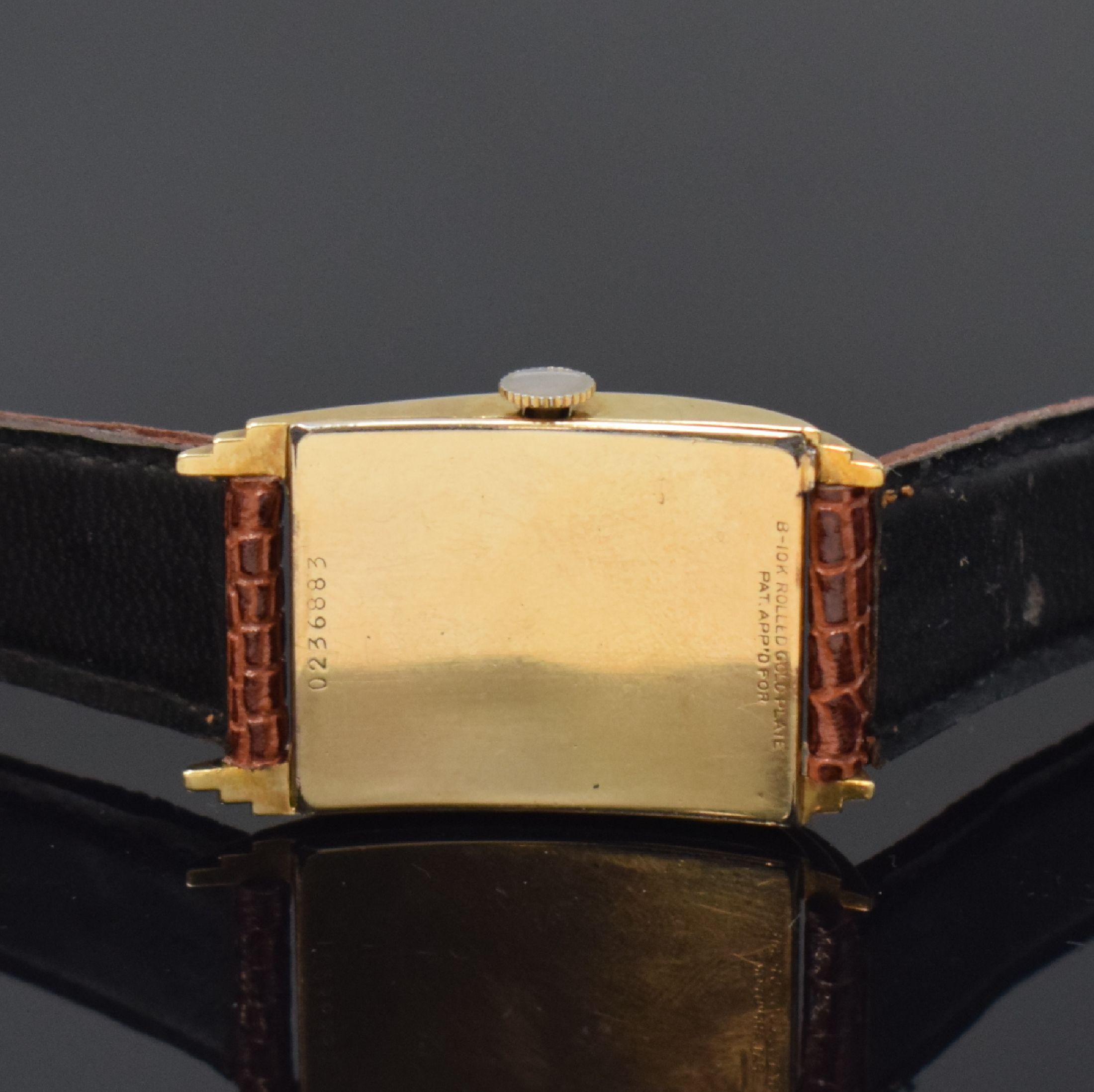 Detail c: BULOVA seltene Pult-förmige Armbanduhr in 10k rolled Gold, USA um 1945, 2-tlg. Geh. m. getreppten Seiten, Boden aufgedr., lachsfarb. Zifferbl. pat., ...