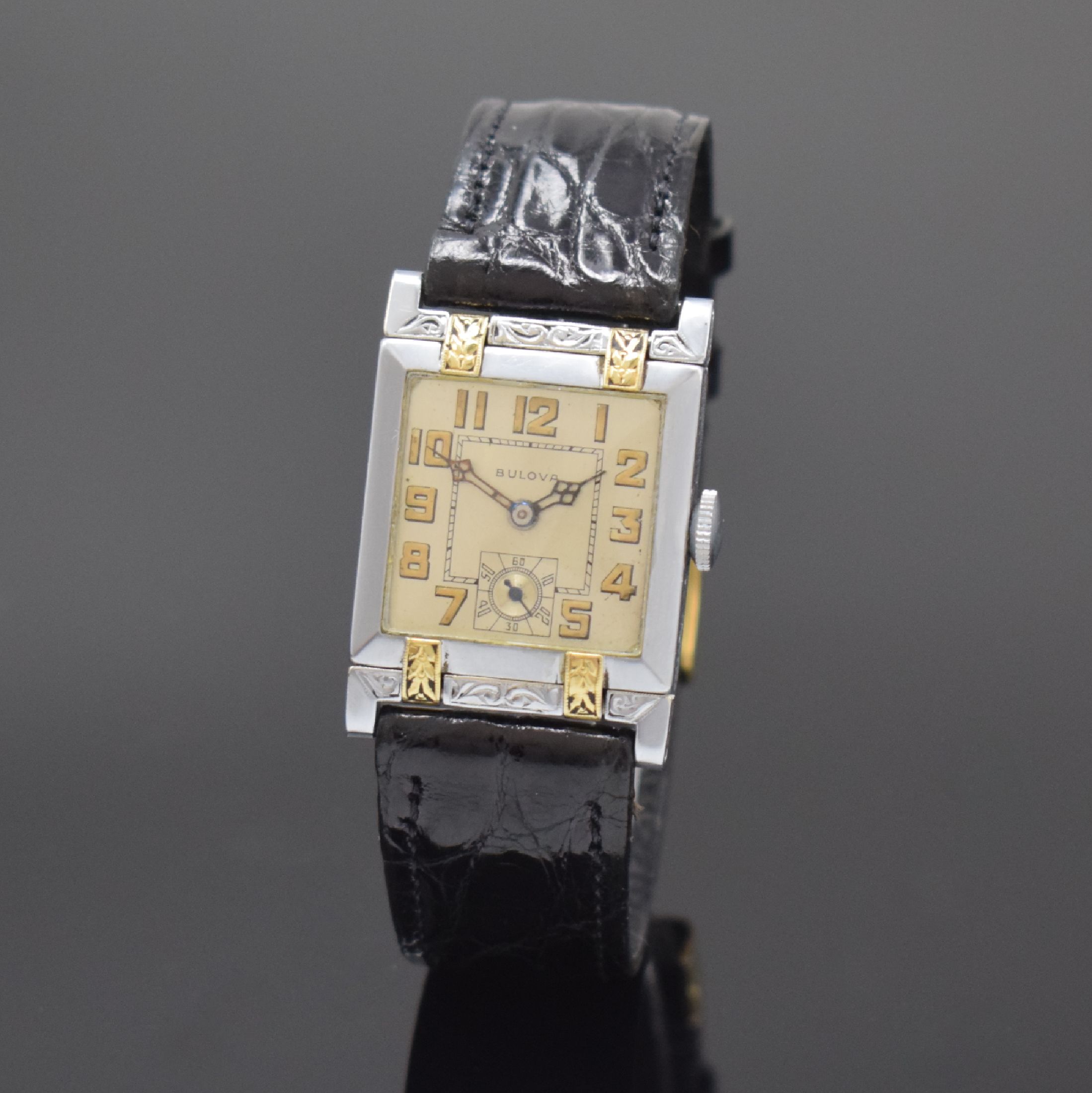 BULOVA seltene frühe Armbanduhr mit beweglichen Anstößen in WG/GG 585/000, USA um 1930, Handaufzug, aufw. Scharniergeh., seitl. u. auf den ...