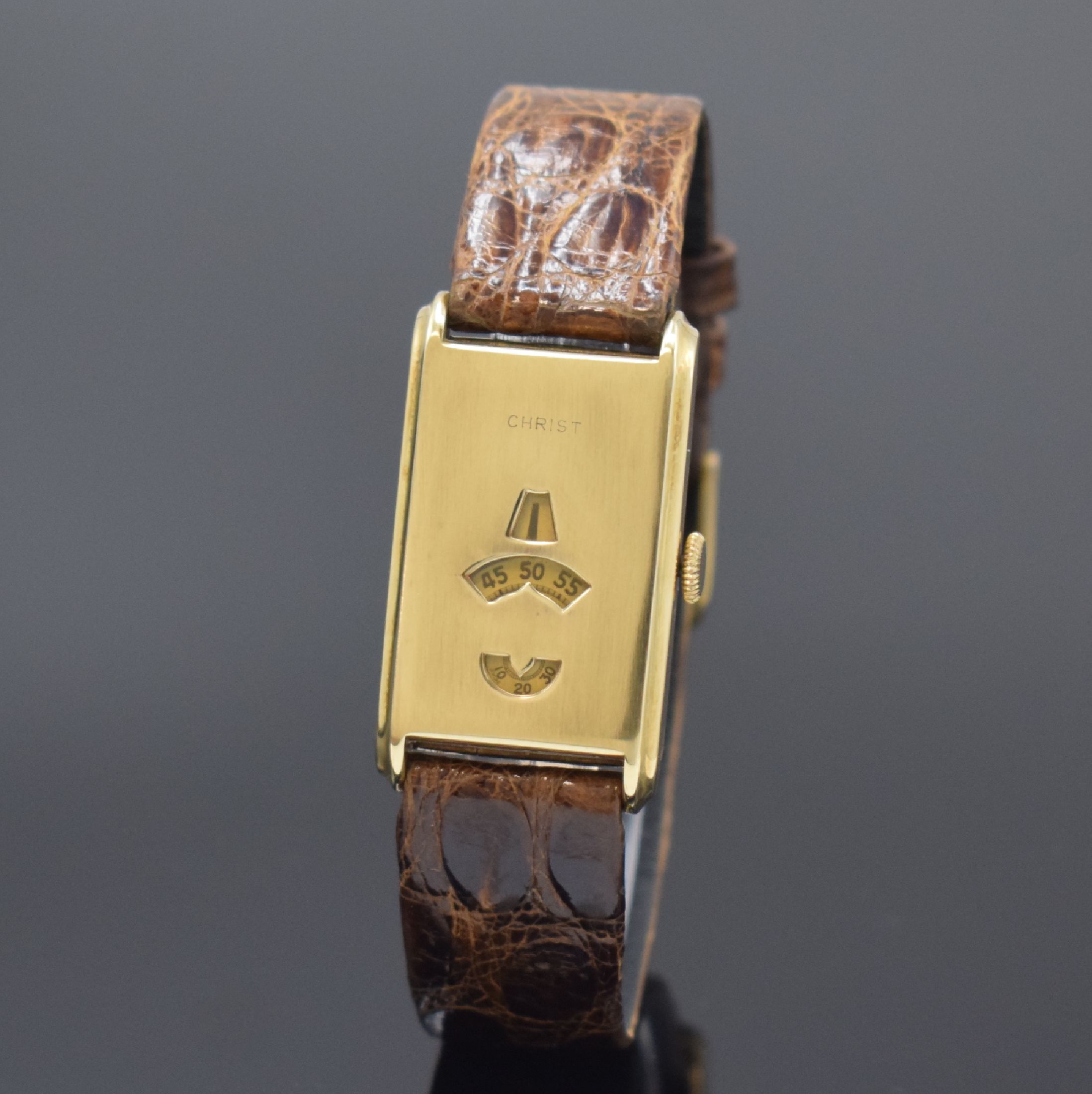 CHRIST seltene digitale Armbanduhr in GG 585/000, Schweiz um 1935, Handaufzug, Scharniergeh., Fenster f. Std., Min. u. Sek., vers. Formwerk, 15 St., ...