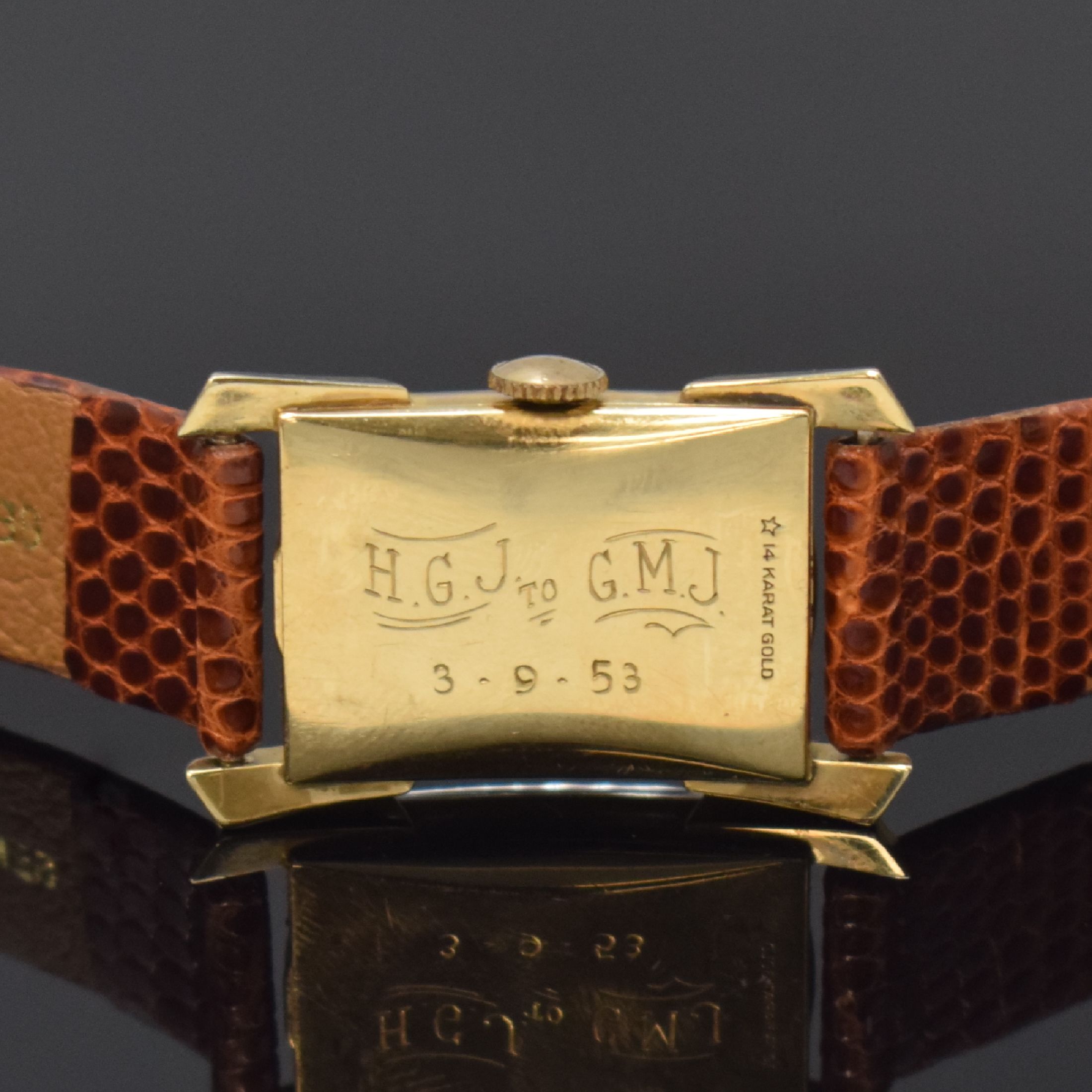 Detail c: LORD ELGIN rechteckige Armbanduhr in GG 585/000, USA um 1950, Handaufzug, 2-tlg. Geh., Boden m. Widmungsgrav. aufgedr., weißes Zifferbl. rest., ...