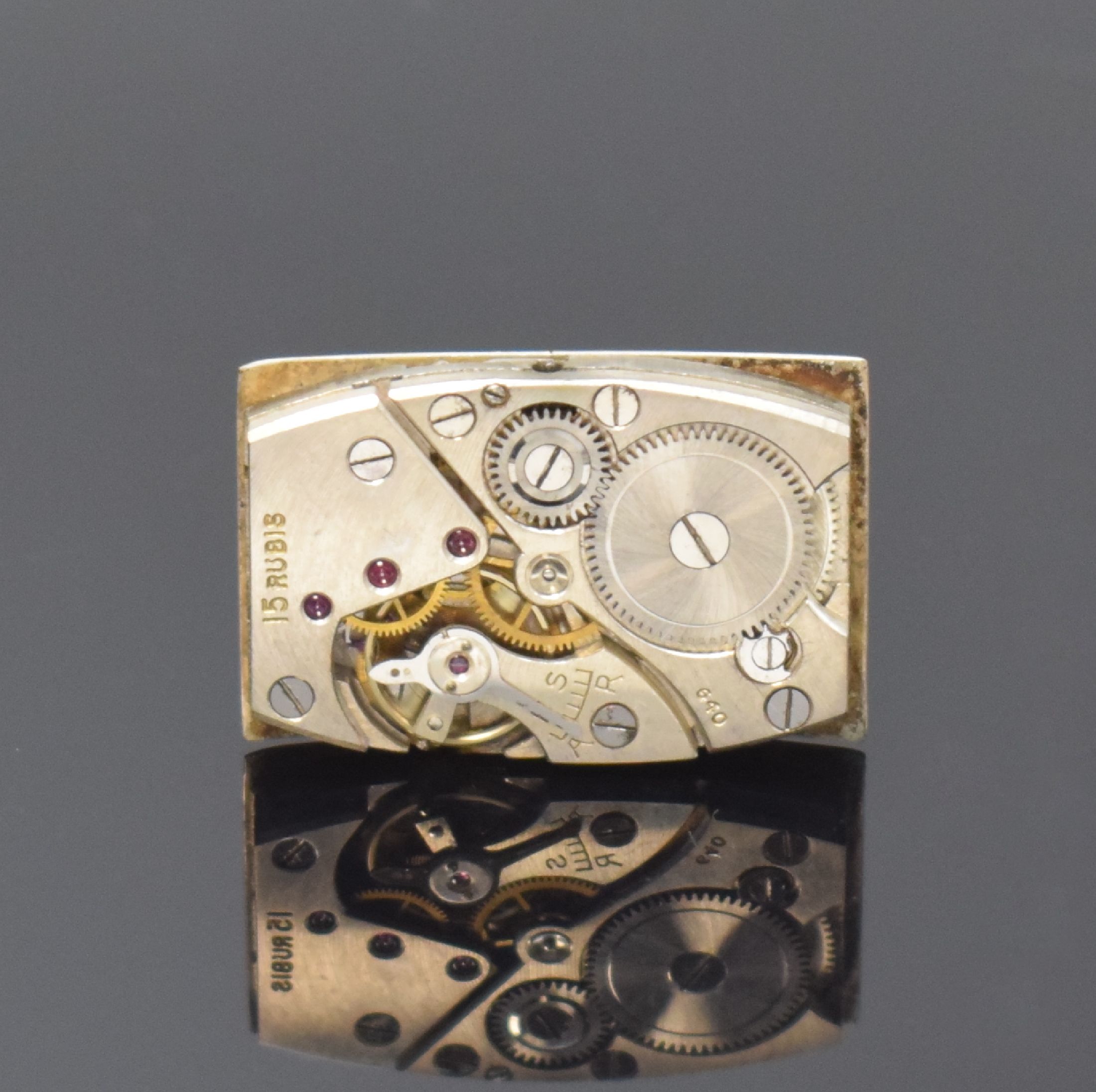 Detail e: FAVRE LEUBA rechteckige Armbanduhr in GG 750/000, Schweiz um 1940, Handaufzug, 2-tlg. Geh., Boden aufgedr., silb. Zifferbl. rest., gebl. Zeiger, ...