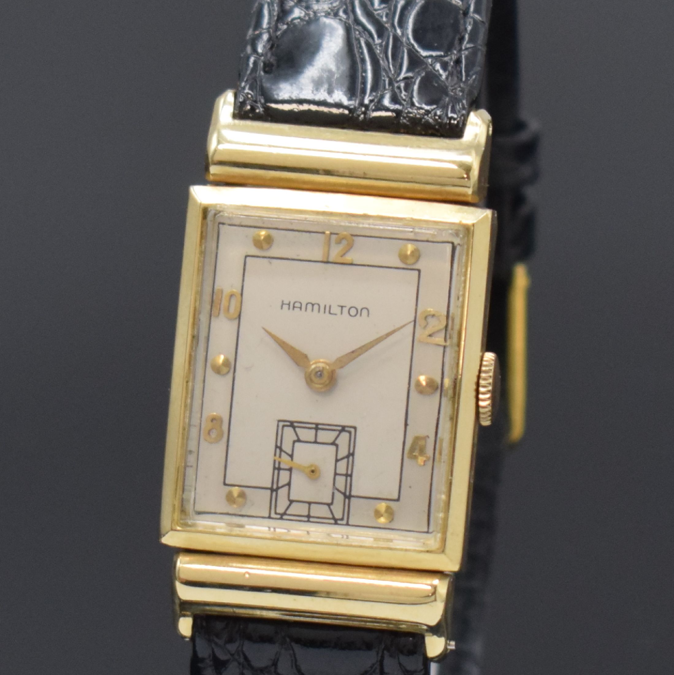 Detail a: HAMILTON rechteckige Armbanduhr in 14k Gelbgold, USA um 1950, Handaufzug, 2-tlg. Geh. m. aufgedr. Boden dell., silb. Duoton- Zifferbl. rest., aufges. ...