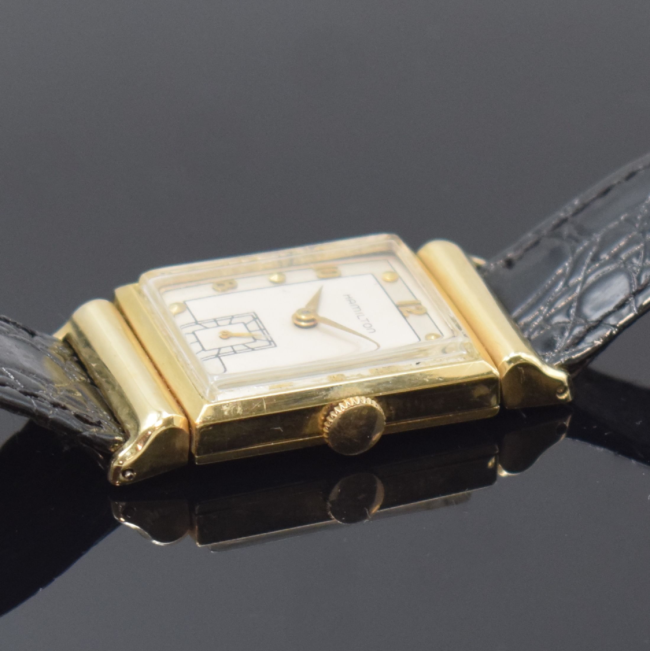 Detail b: HAMILTON rechteckige Armbanduhr in 14k Gelbgold, USA um 1950, Handaufzug, 2-tlg. Geh. m. aufgedr. Boden dell., silb. Duoton- Zifferbl. rest., aufges. ...