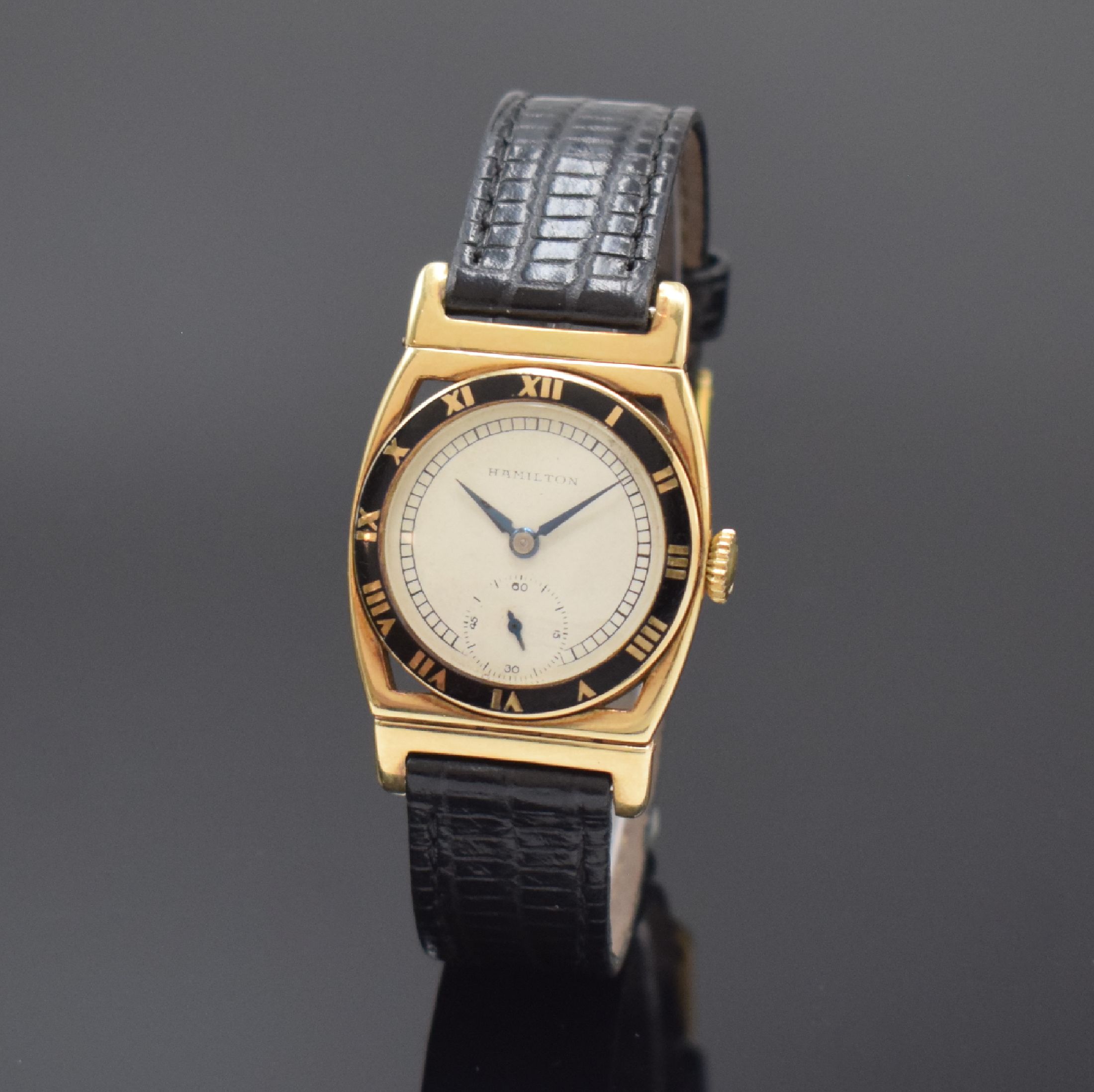 HAMILTON Piping Rock seltene Art-Deco Armbanduhr in GG 585/000, USA um 1930, Handaufzug, Tonneau-Geh. m. bewegl. Anstößen, in schwarz emaillierter ...