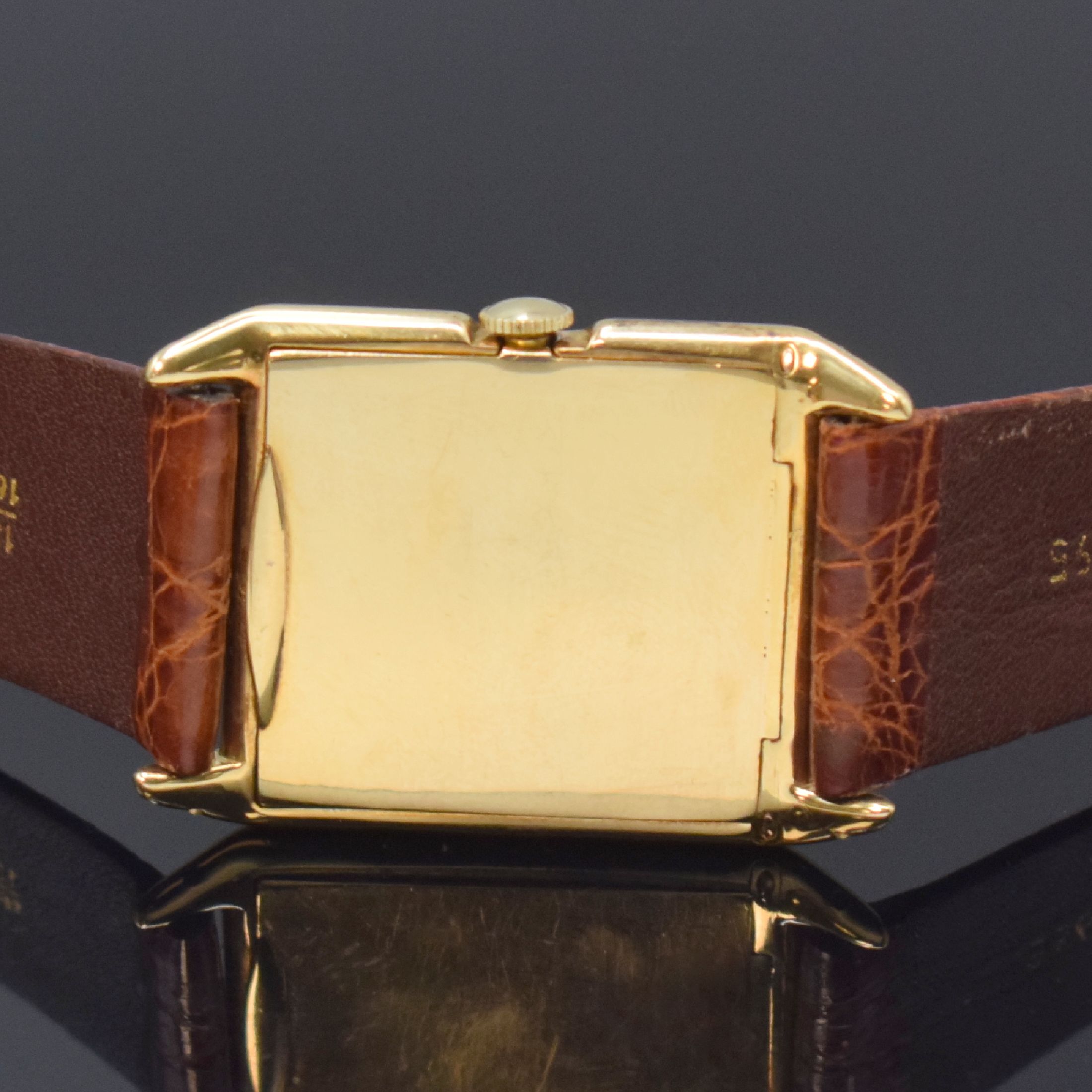 Detail c: IWC / Tiffany & Co. rechteckige Armbanduhr in 18k Gelbgold, Schweiz / USA um 1930, Handaufzug, amerikanisches Scharniergeh., silb. Zifferbl. rest., ...