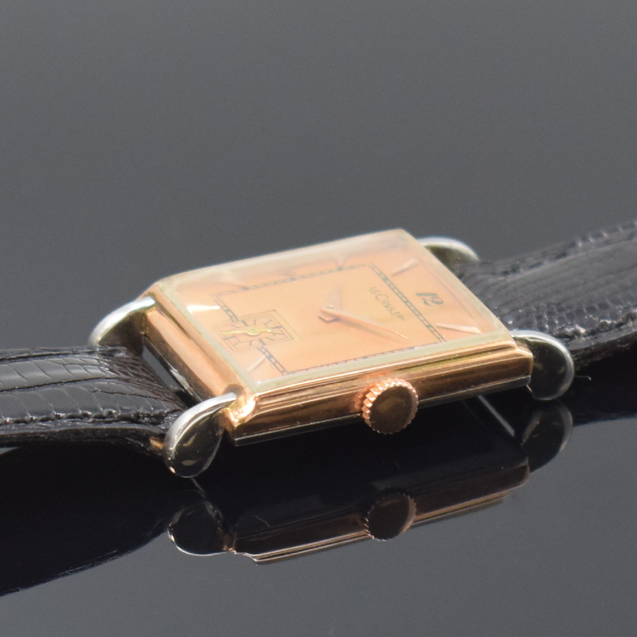Detail b: Le COULTRE rechteckige Armbanduhr in Stahl/ Rotgold, Schweiz um 1940, Handaufzug, 2-tlg. Geh., Boden aufgedr., rotgold. Zifferbl. rest., aufges. ...