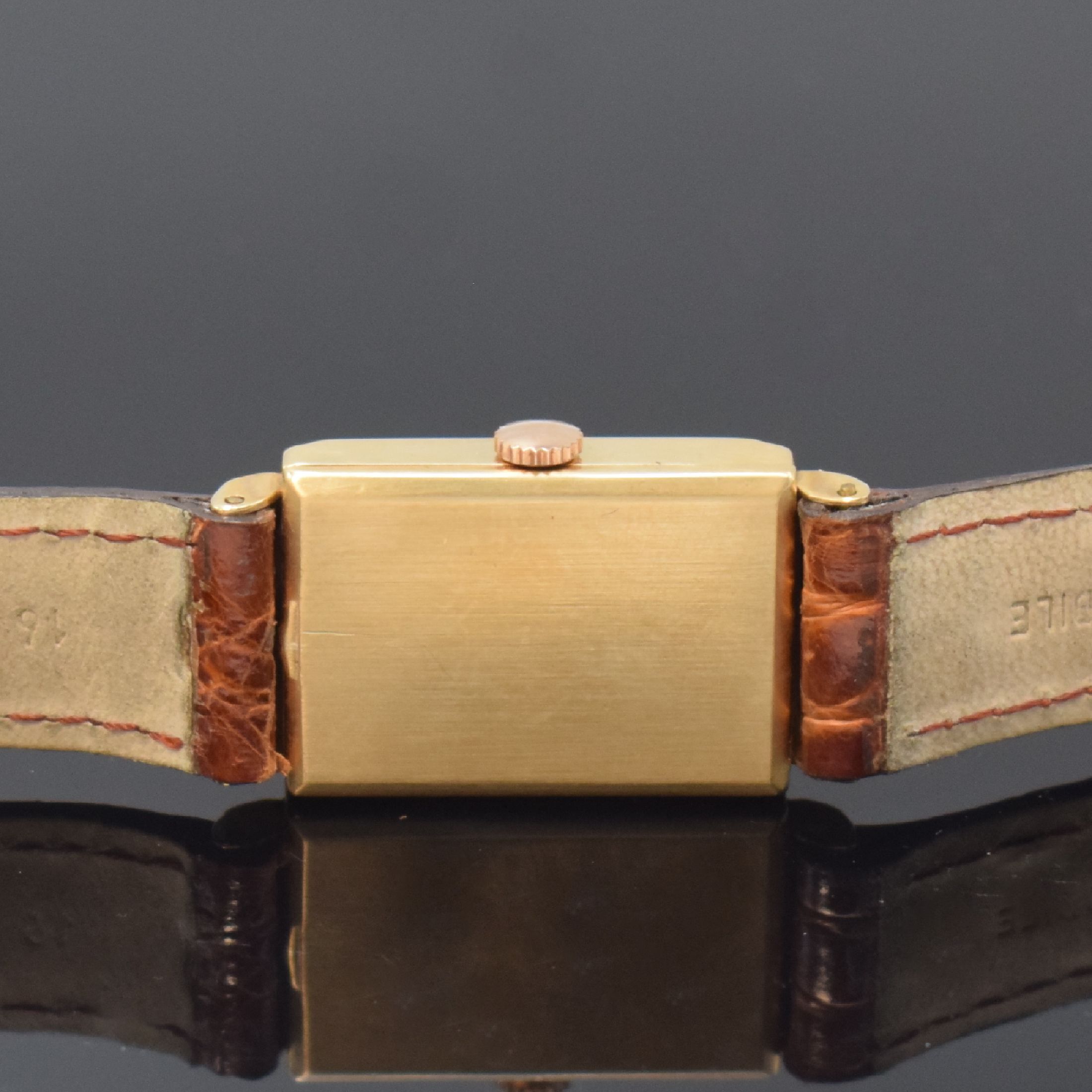 Detail c: LeCoultre rechteckige Armbanduhr in 14k Gelbgold, Schweiz / USA um 1940, Handaufzug, 2-tlg. Geh. m. verd. Anstößen, Boden aufgedr., silb. ...