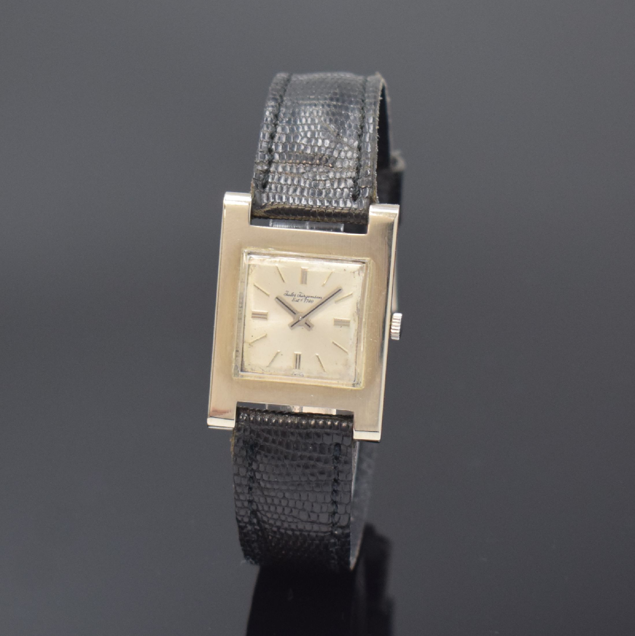 JULES JÜRGENSEN elegante rechteckige Armbanduhr in WG 750/000, Schweiz um 1960, Handaufzug, 2-tlg. Geh., Boden aufgedr., silb. Zifferbl. fl., verg. ...