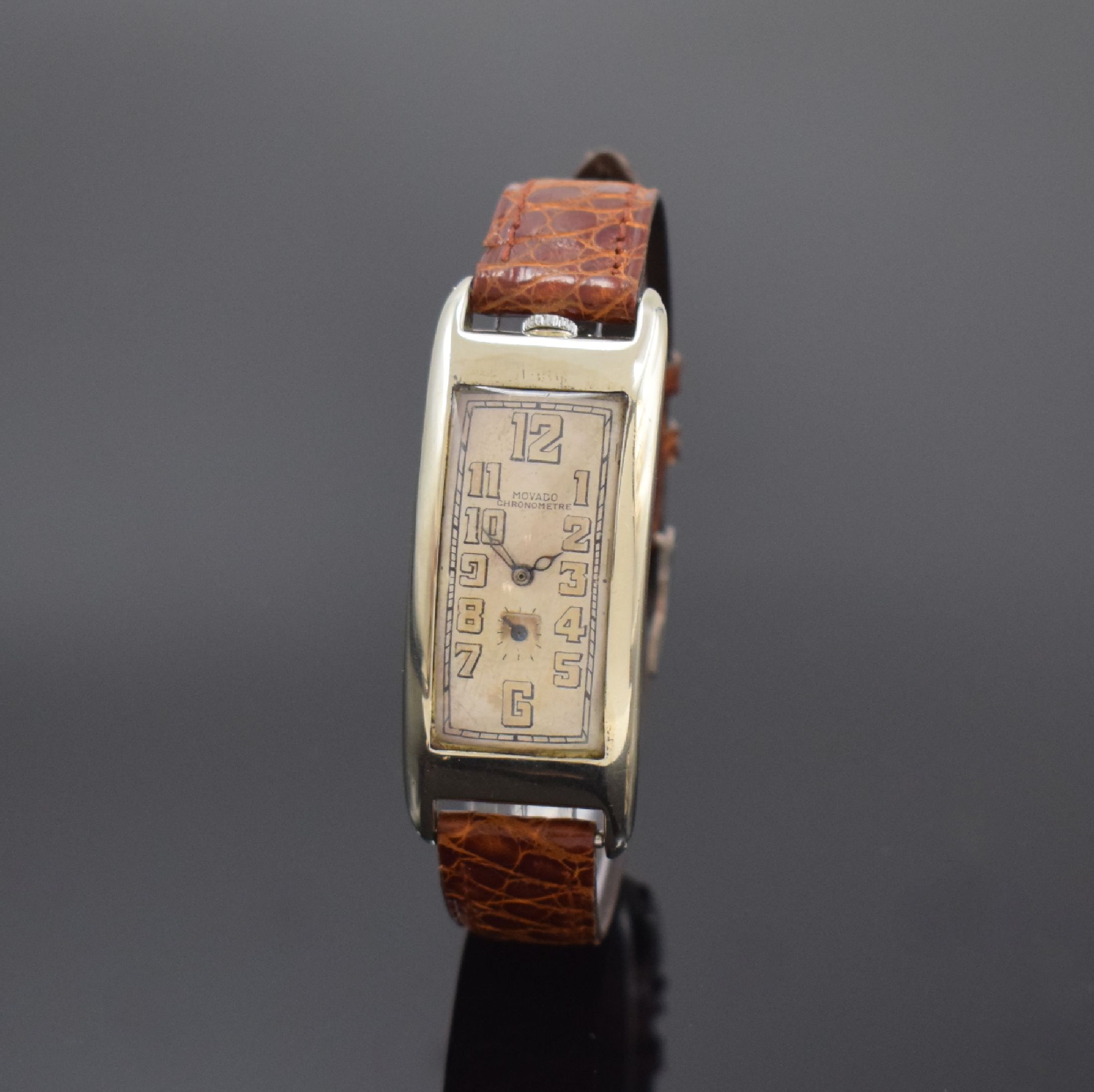 MOVADO Polyplan Referenz 4009 seltene, große rechteckige Armbanduhr in WG 750/000, Schweiz um 1915, Handaufzug, stark gebogenes Scharniergeh., silb. ...