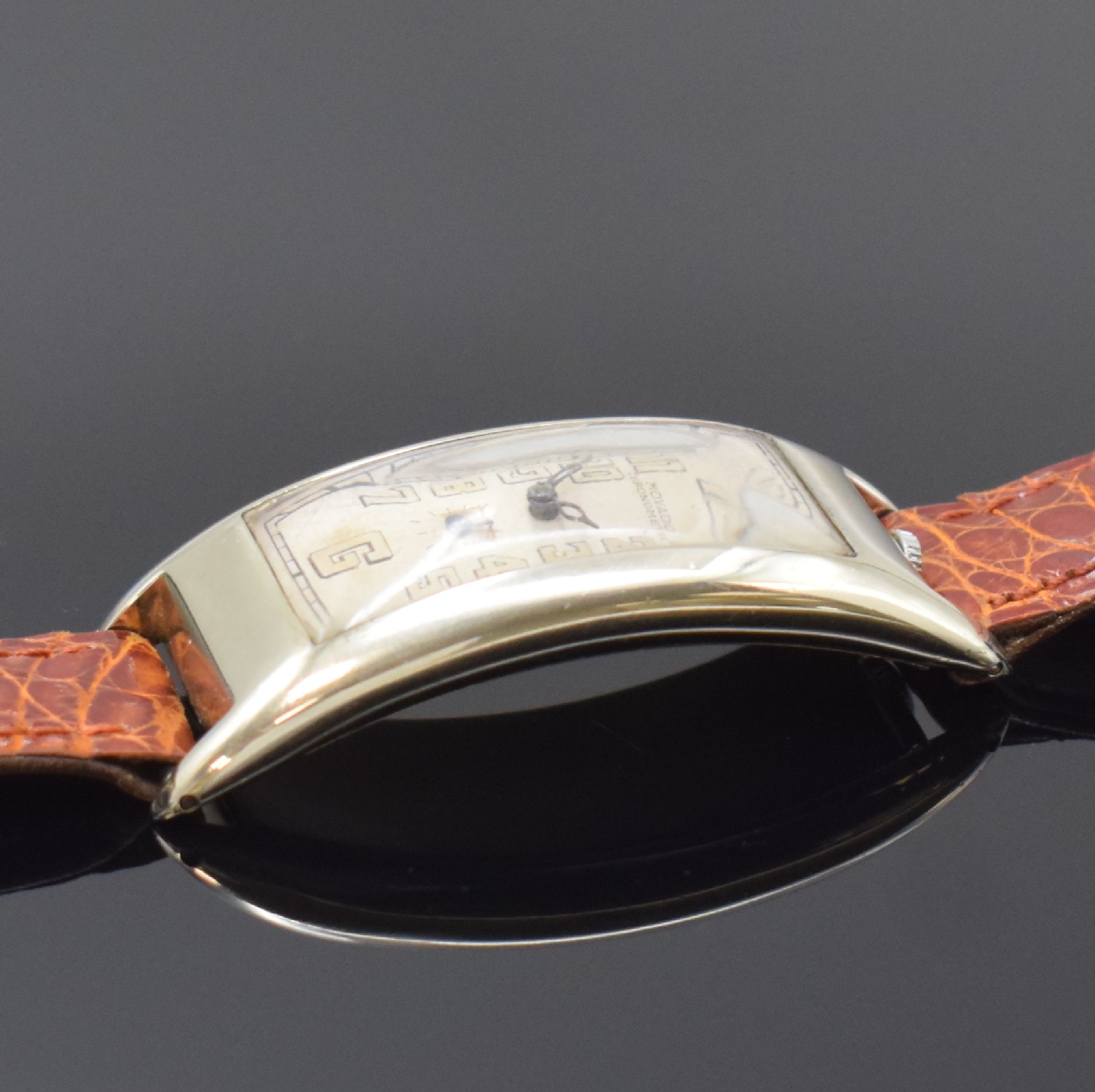 Detail b: MOVADO Polyplan Referenz 4009 seltene, große rechteckige Armbanduhr in WG 750/000, Schweiz um 1915, Handaufzug, stark gebogenes Scharniergeh., silb. ...