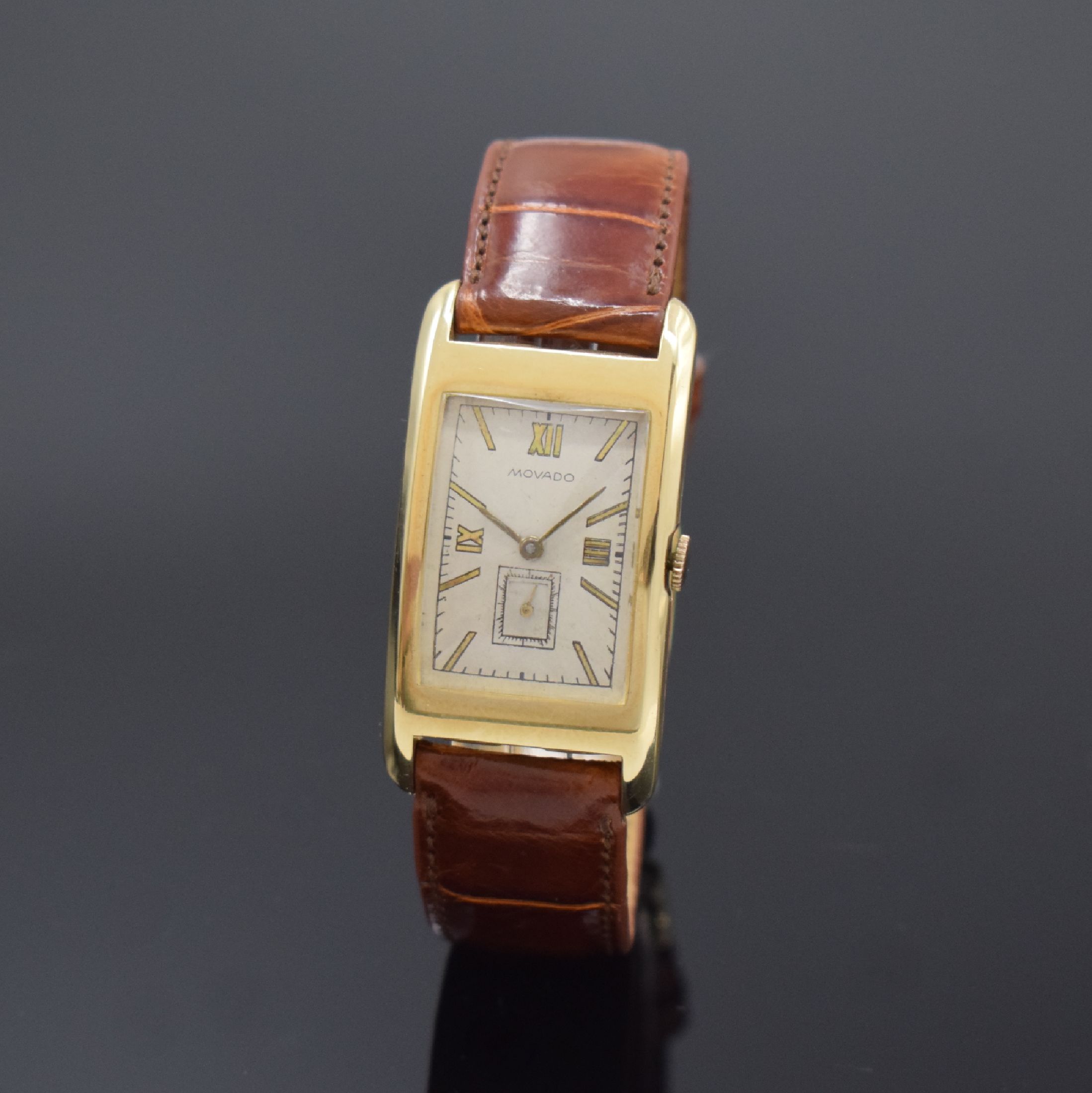 MOVADO rechteckige Armbanduhr Referenz 41819 in GG 585/000, Schweiz / USA um 1935, Handaufzug, 2-tlg. USA-Geh., Boden aufgedr., silb. Zifferbl. ...
