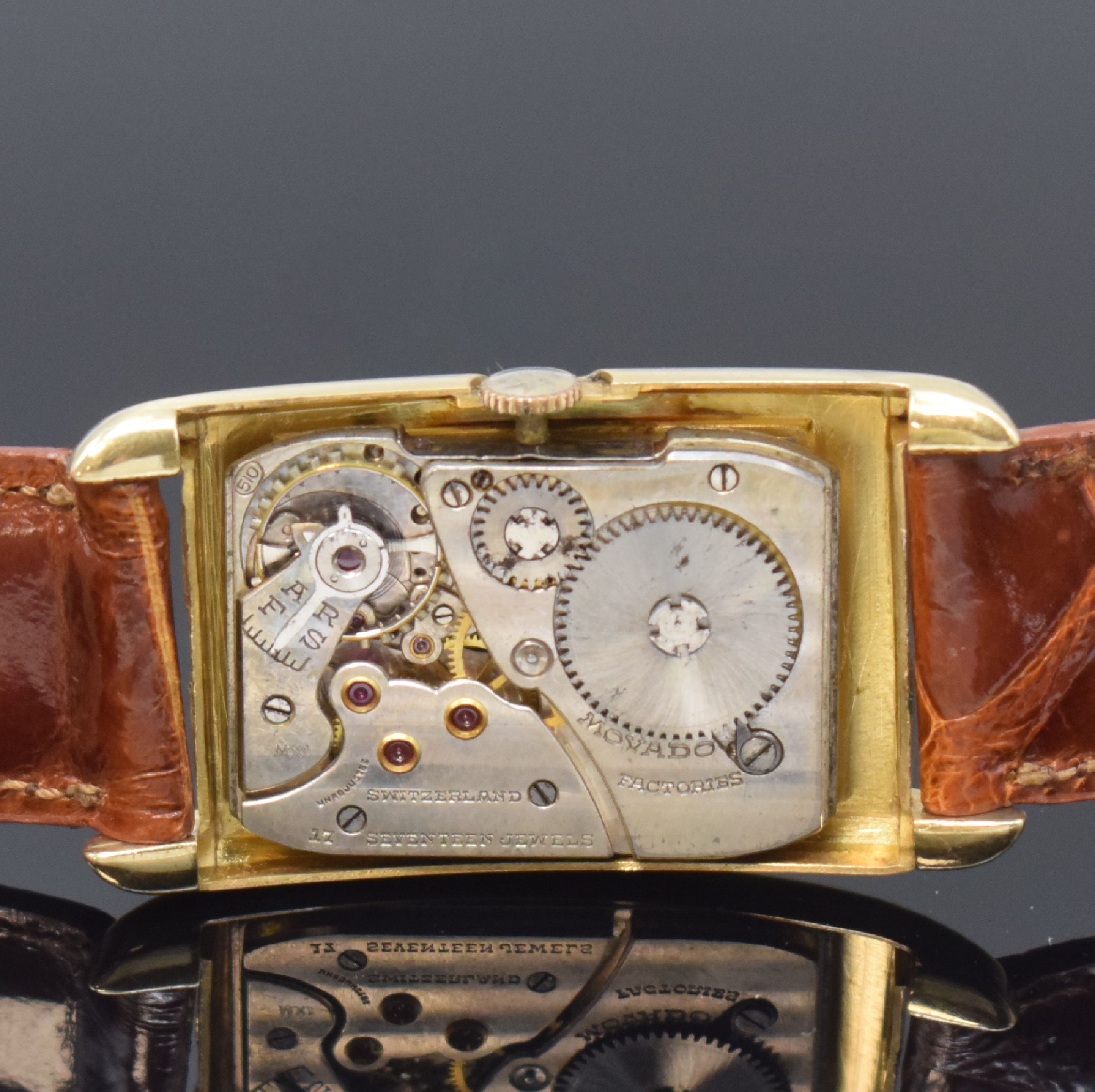 Detail d: MOVADO rechteckige Armbanduhr Referenz 41819 in GG 585/000, Schweiz / USA um 1935, Handaufzug, 2-tlg. USA-Geh., Boden aufgedr., silb. Zifferbl. ...