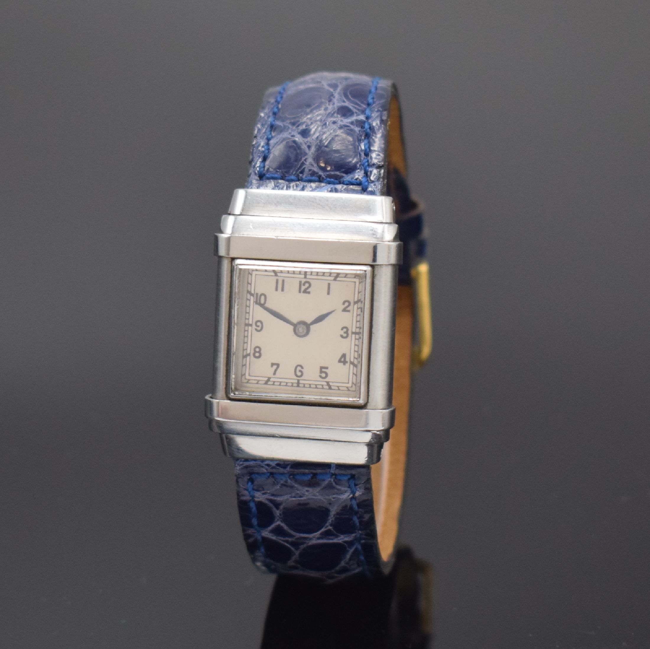 OMEGA WATCH CO / TISSOT Marine seltene rechteckige Armbanduhr in Stahl, Schweiz um 1935, Handaufzug, abnehmbares Doppelgehäuse, rücks. über ...