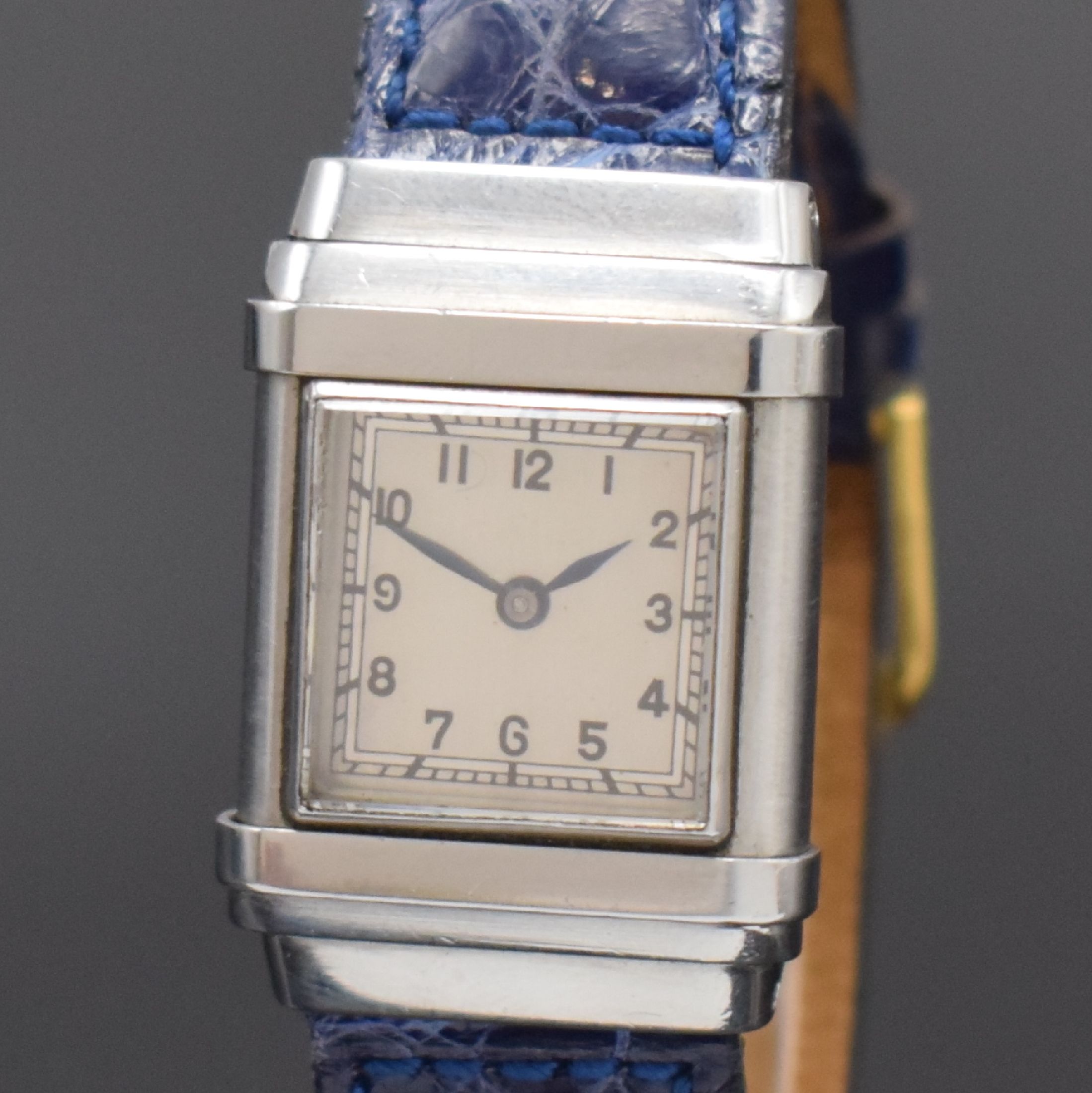 Detail a: OMEGA WATCH CO / TISSOT Marine seltene rechteckige Armbanduhr in Stahl, Schweiz um 1935, Handaufzug, abnehmbares Doppelgehäuse, rücks. über ...