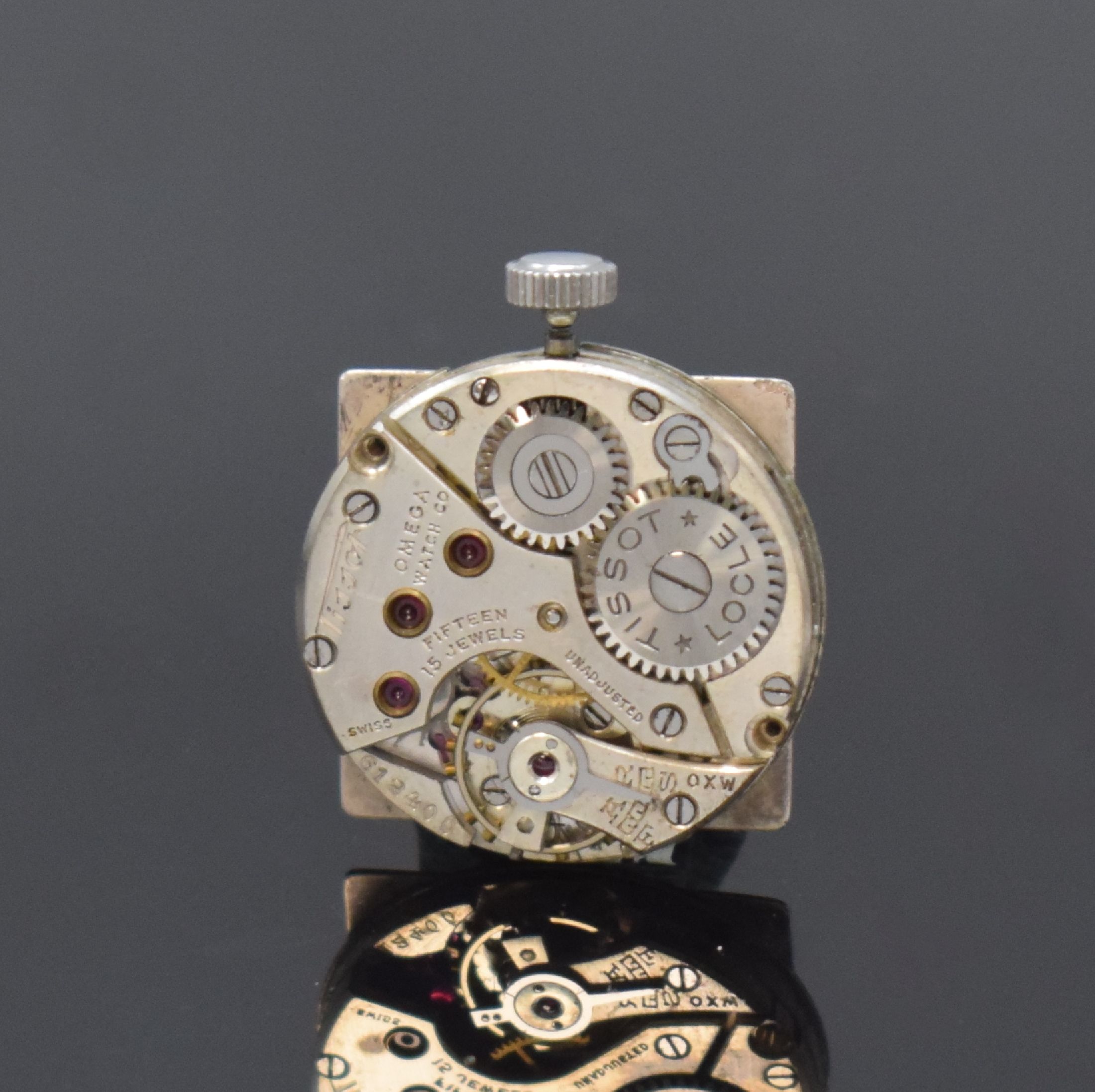Detail h: OMEGA WATCH CO / TISSOT Marine seltene rechteckige Armbanduhr in Stahl, Schweiz um 1935, Handaufzug, abnehmbares Doppelgehäuse, rücks. über ...