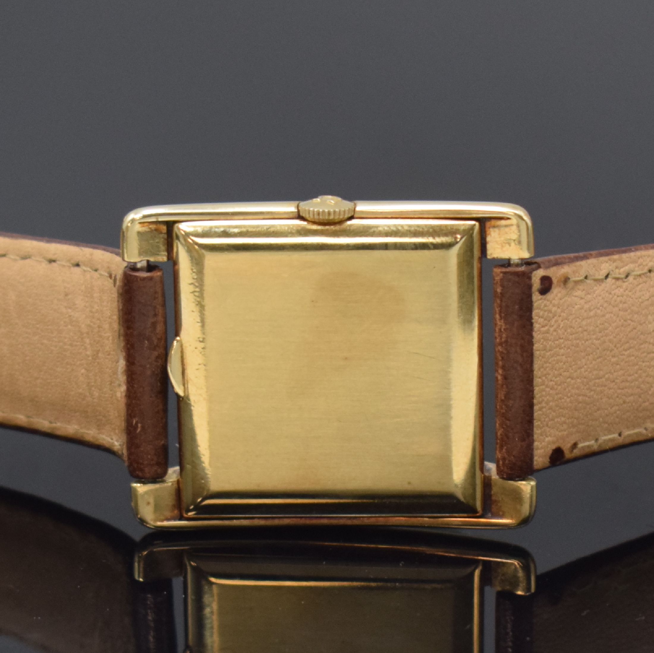 Detail c: OMEGA rechteckige Armbanduhr in GG 585/000, Schweiz um 1947, Handaufzug, 2-tlg. Geh., Boden aufgedr., silb. Zifferbl. rest., aufges. gold. Indizes, ...