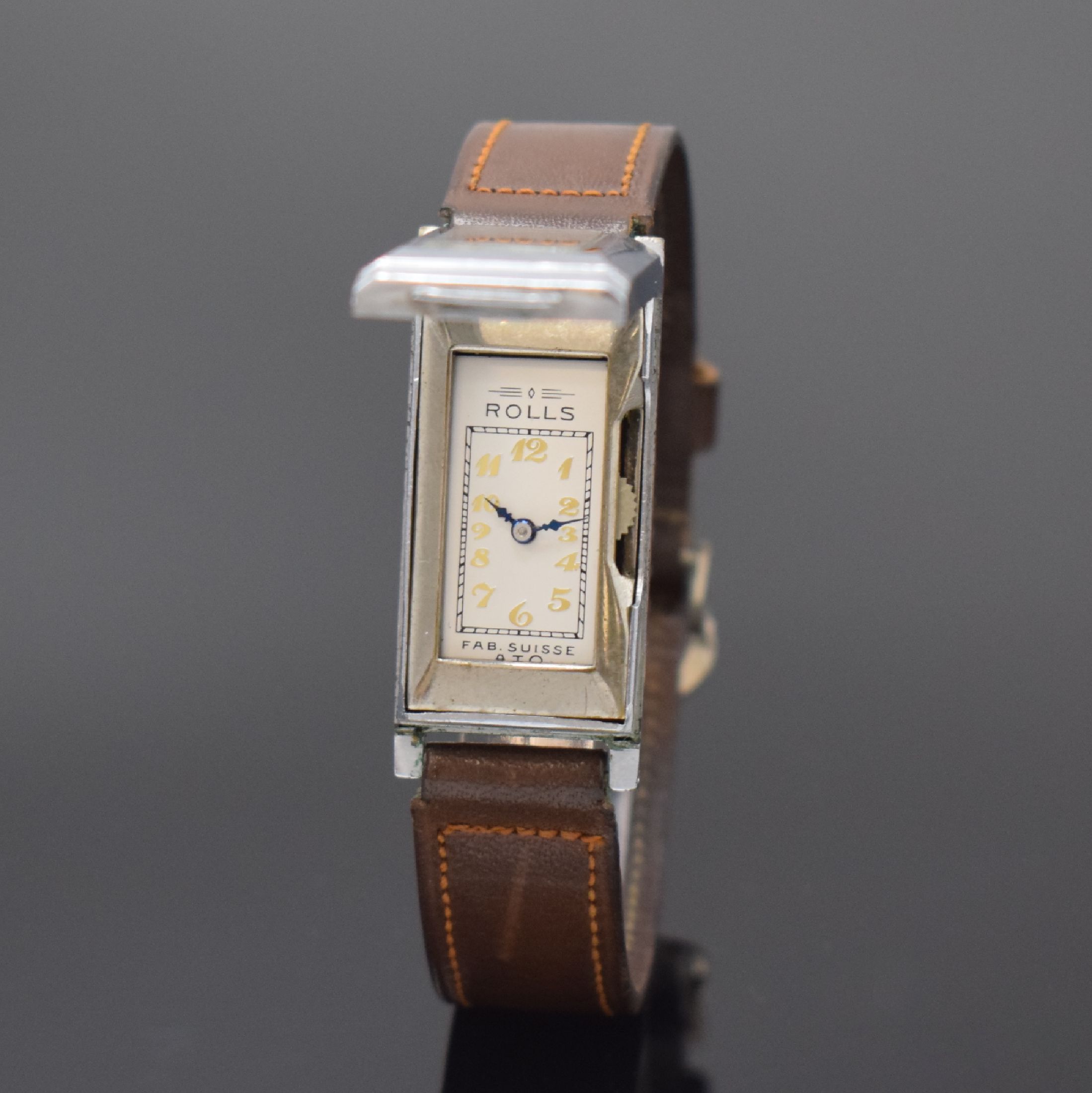 ATO ROLLS / JULES RACINE frühe Automatik- Armbanduhr, Schweiz um 1930, rechteckiges Scharniergeh., verchromt, darin Rüttelkammer für das ...