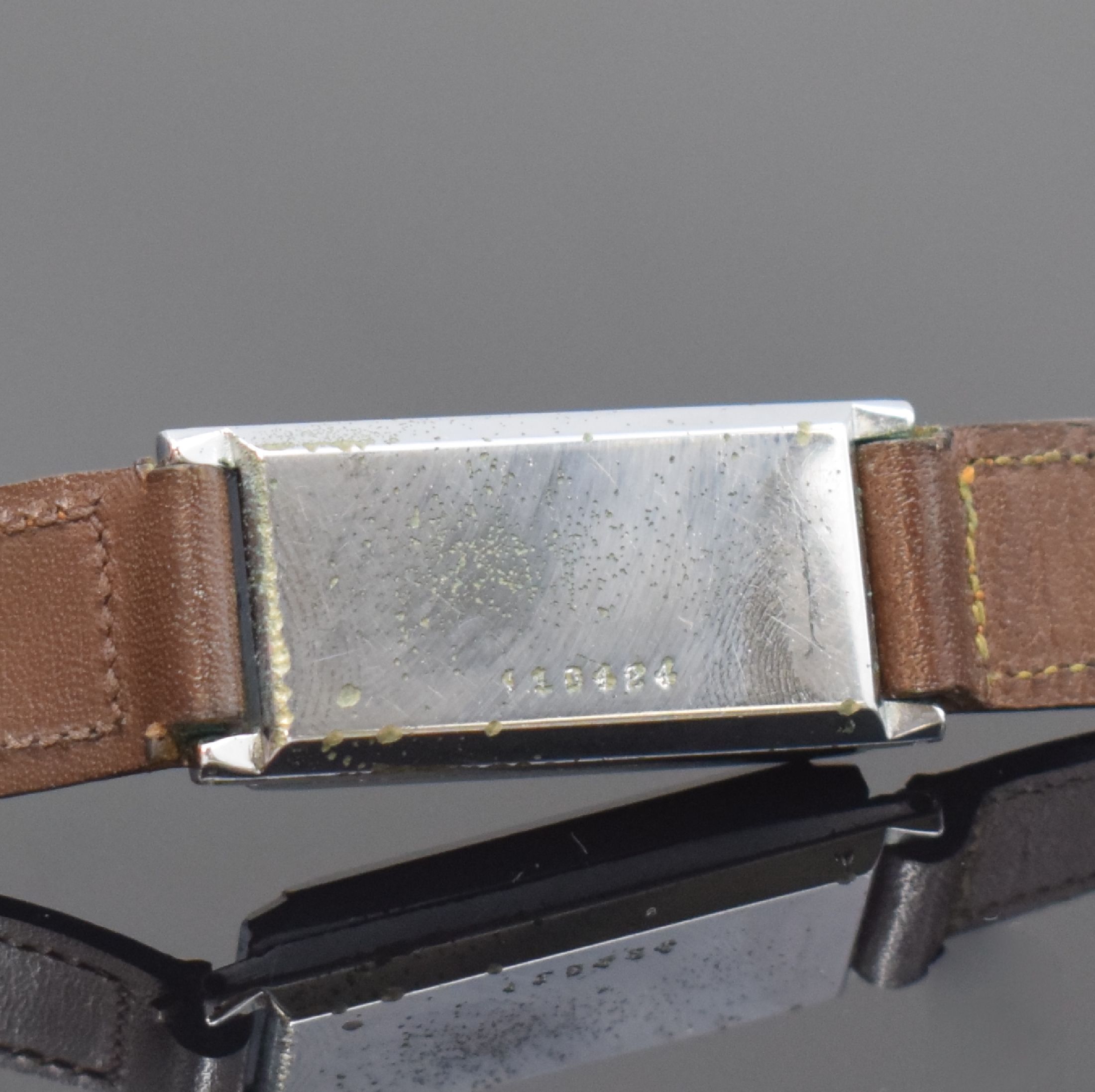 Detail b: ATO ROLLS / JULES RACINE frühe Automatik- Armbanduhr, Schweiz um 1930, rechteckiges Scharniergeh., verchromt, darin Rüttelkammer für das ...
