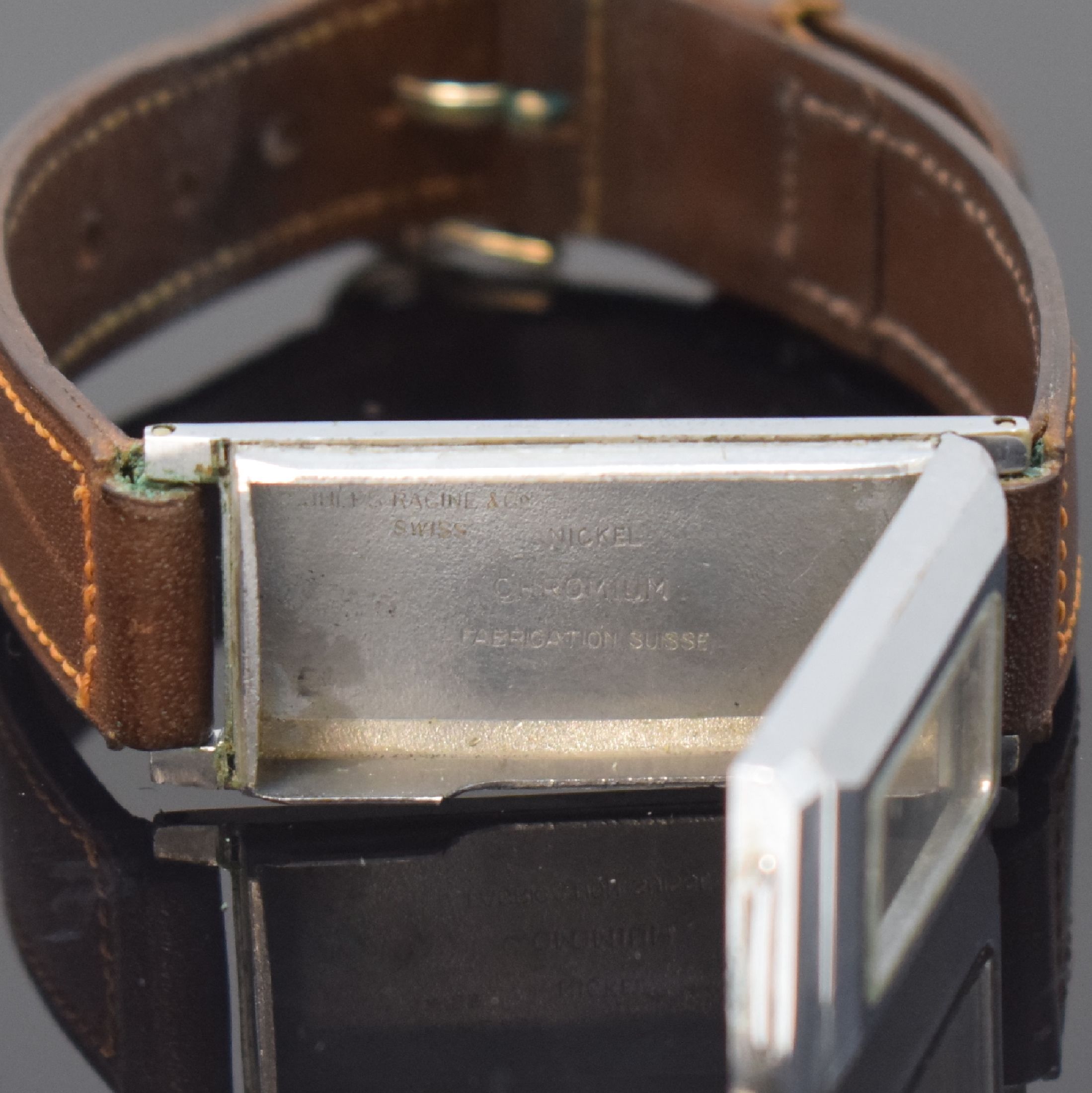 Detail c: ATO ROLLS / JULES RACINE frühe Automatik- Armbanduhr, Schweiz um 1930, rechteckiges Scharniergeh., verchromt, darin Rüttelkammer für das ...