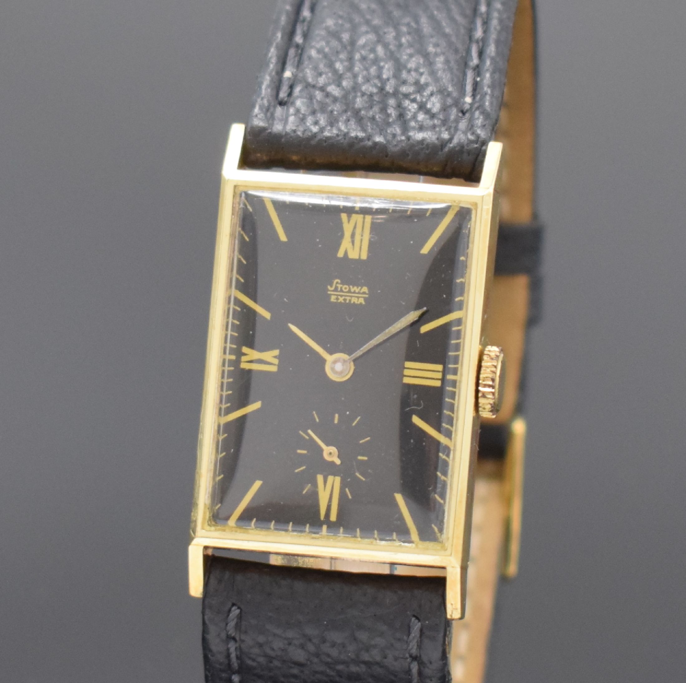 Detail a: STOWA Extra rechteckige Armbanduhr in GG 585/000, Deutschland / Schweiz um 1935, Handaufzug, Scharniergeh., schwarzes Glanz- Zifferbl., gold. röm. ...