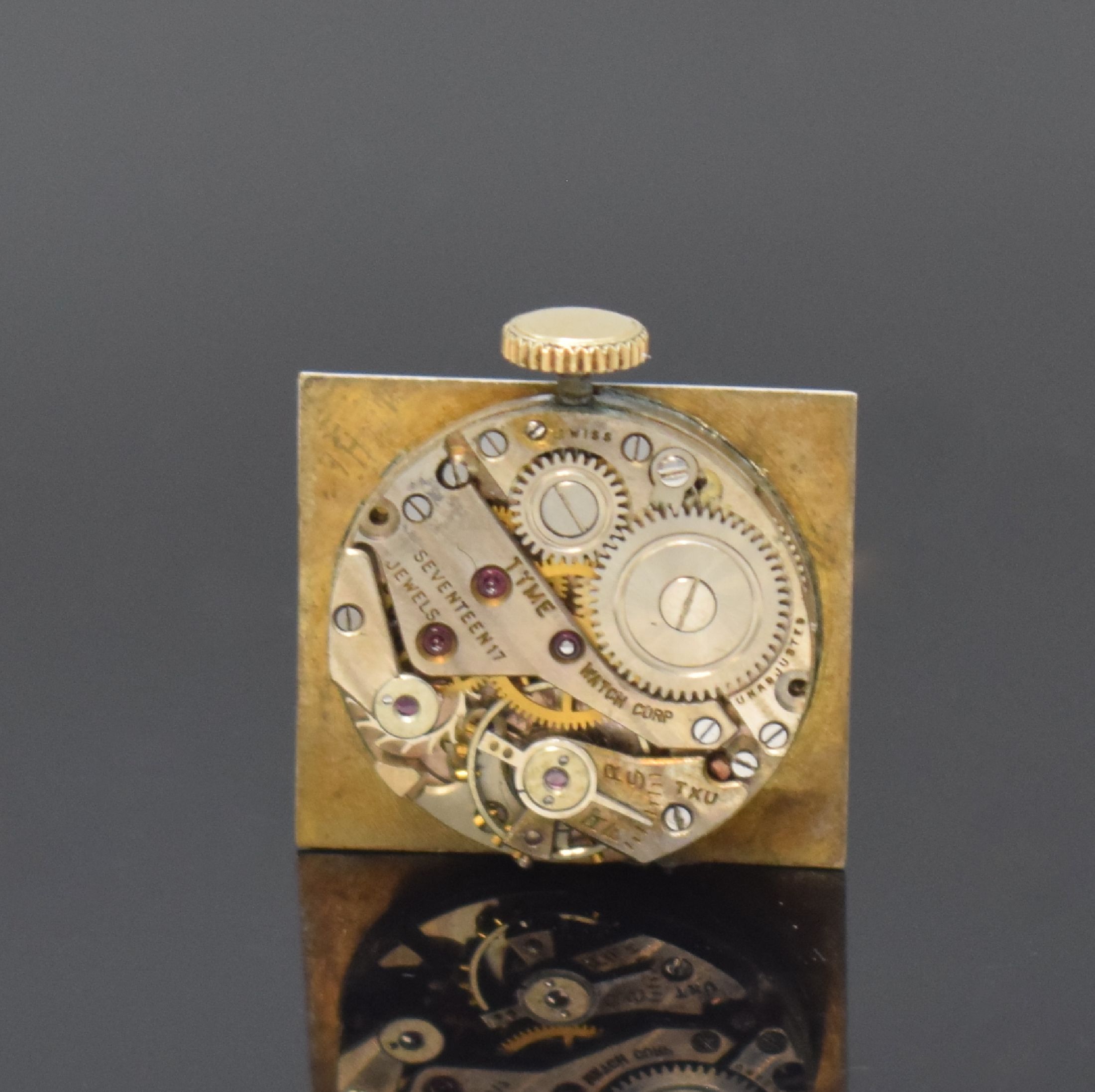 Detail e: THYME WATCH CORP rechteckige Armbanduhr in GG 585/000, USA / Schweiz um 1945, Handaufzug, 2-tlg. Geh. m. verdeckten Anstößen, silb. Zifferbl. bez. ...