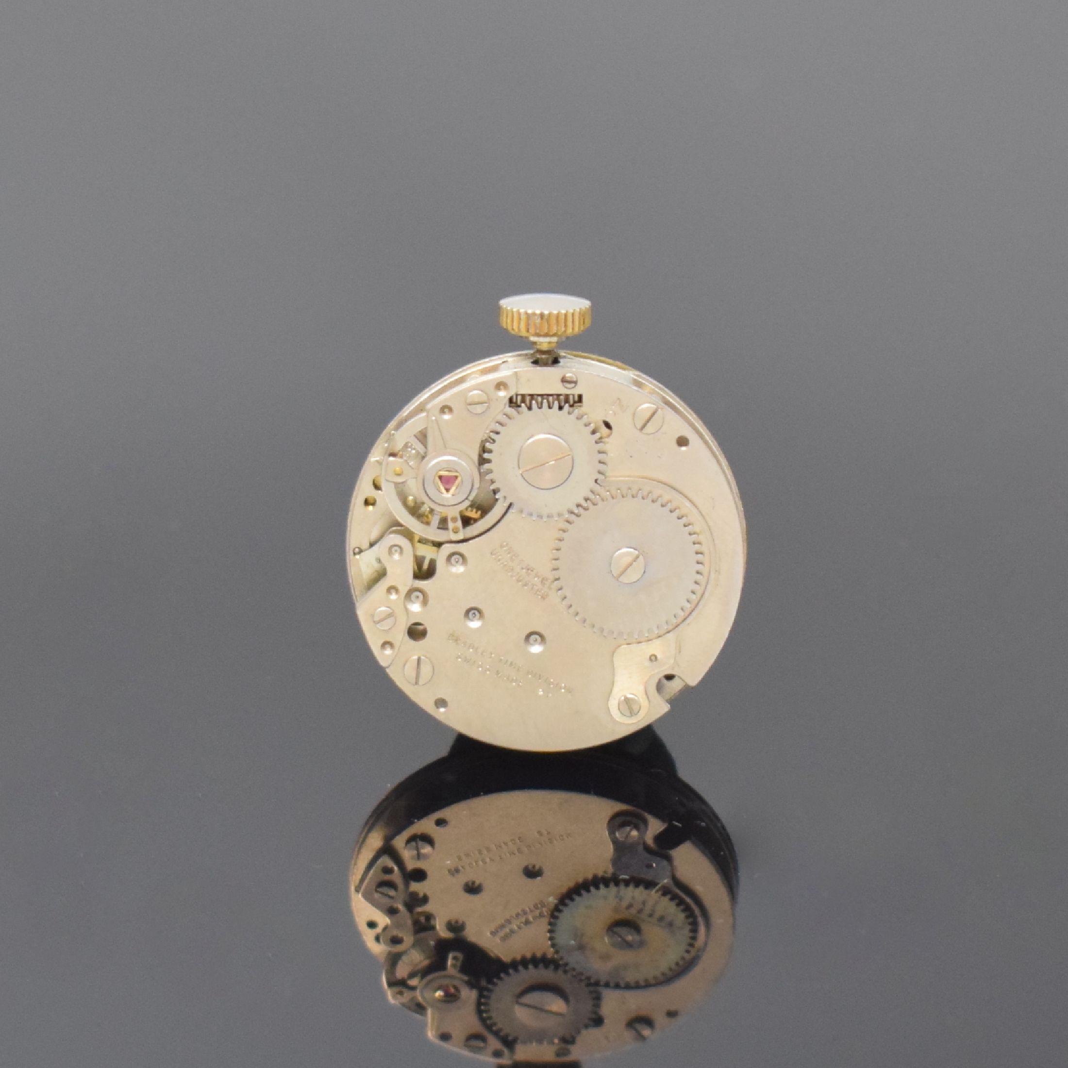 Detail d: WALT-DISNEY-PRODUCTIONS 2 Armbanduhren, USA / Schweiz um 1940 / 1960, Handaufzug, Metallgeh. m. aufgedr. Boden, 1 x US-TIME tonneauförm., verg., ...