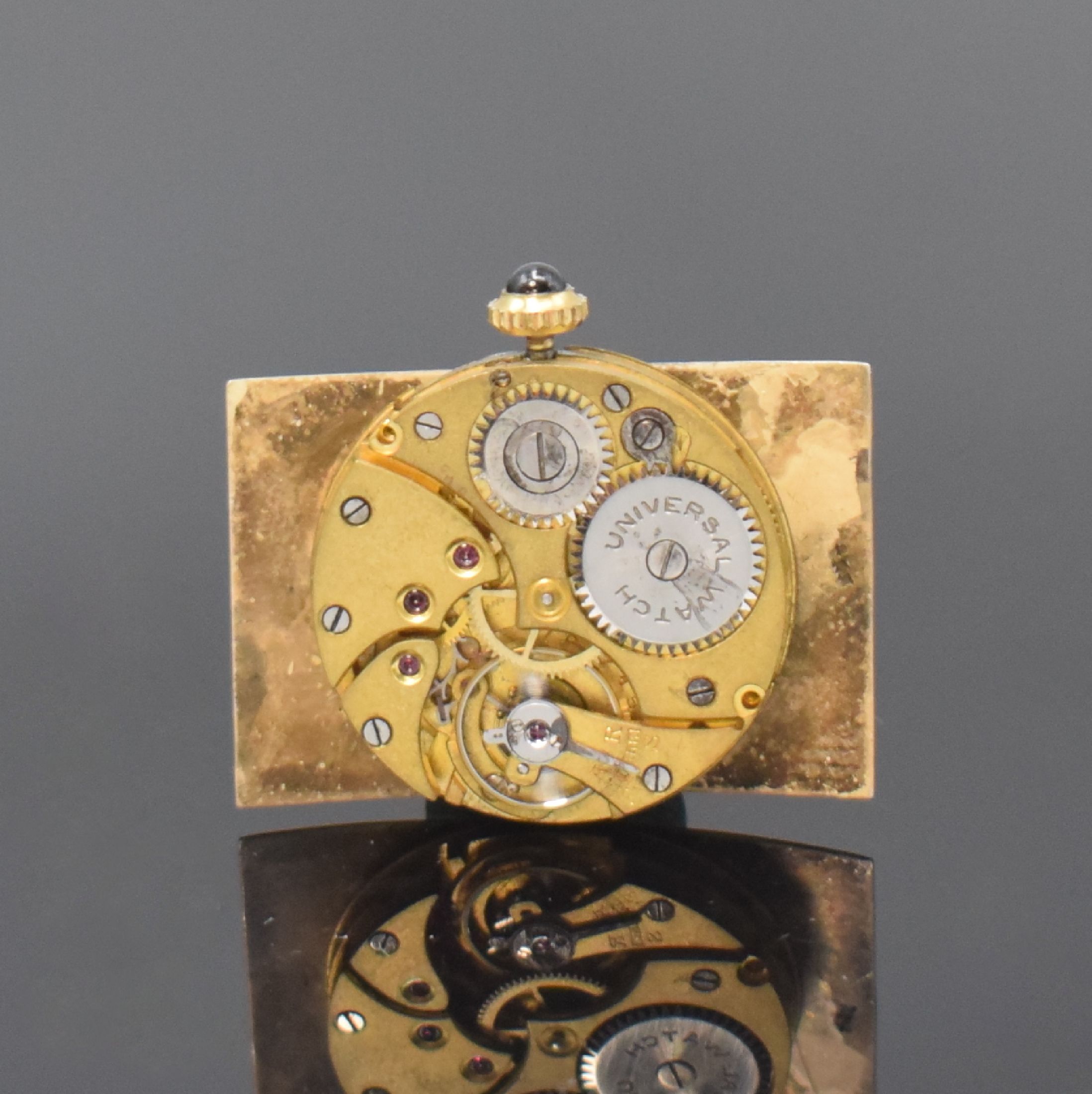 Detail f: UNIVERSAL GENEVE große rechteckige Armbanduhr in GG 750/000, Schweiz um 1930, Handaufzug, Scharniergeh. m. grav. Rand, silb. Zifferbl. rest., Zeiger ...