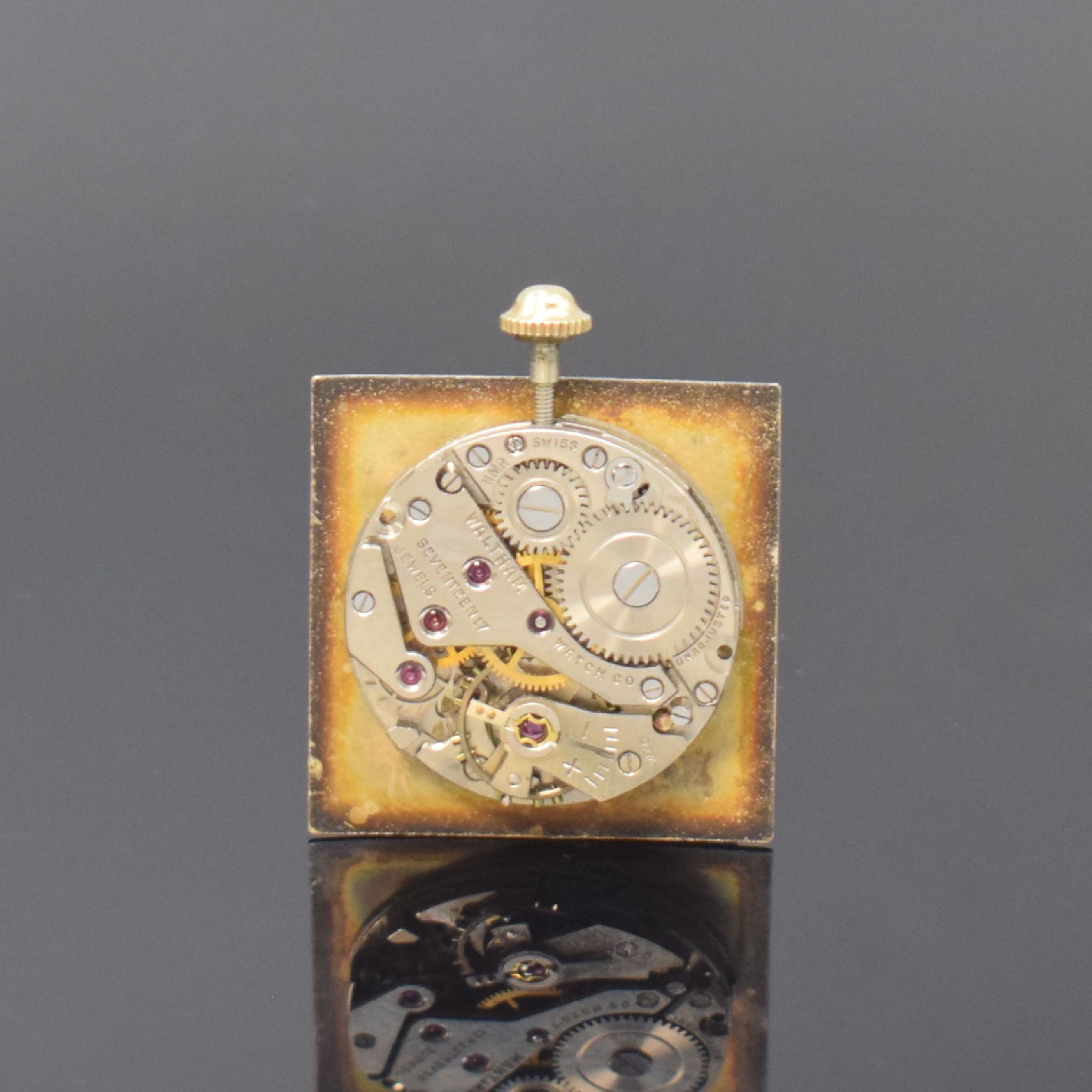 Detail d: WALTHAM große rechteckige Armbanduhr in GG 585/000, USA / Schweiz um 1955, Handaufzug, 2-tlg. Geh., Lünette aufgedr., silb. quadrat. Zifferbl. fl., ...