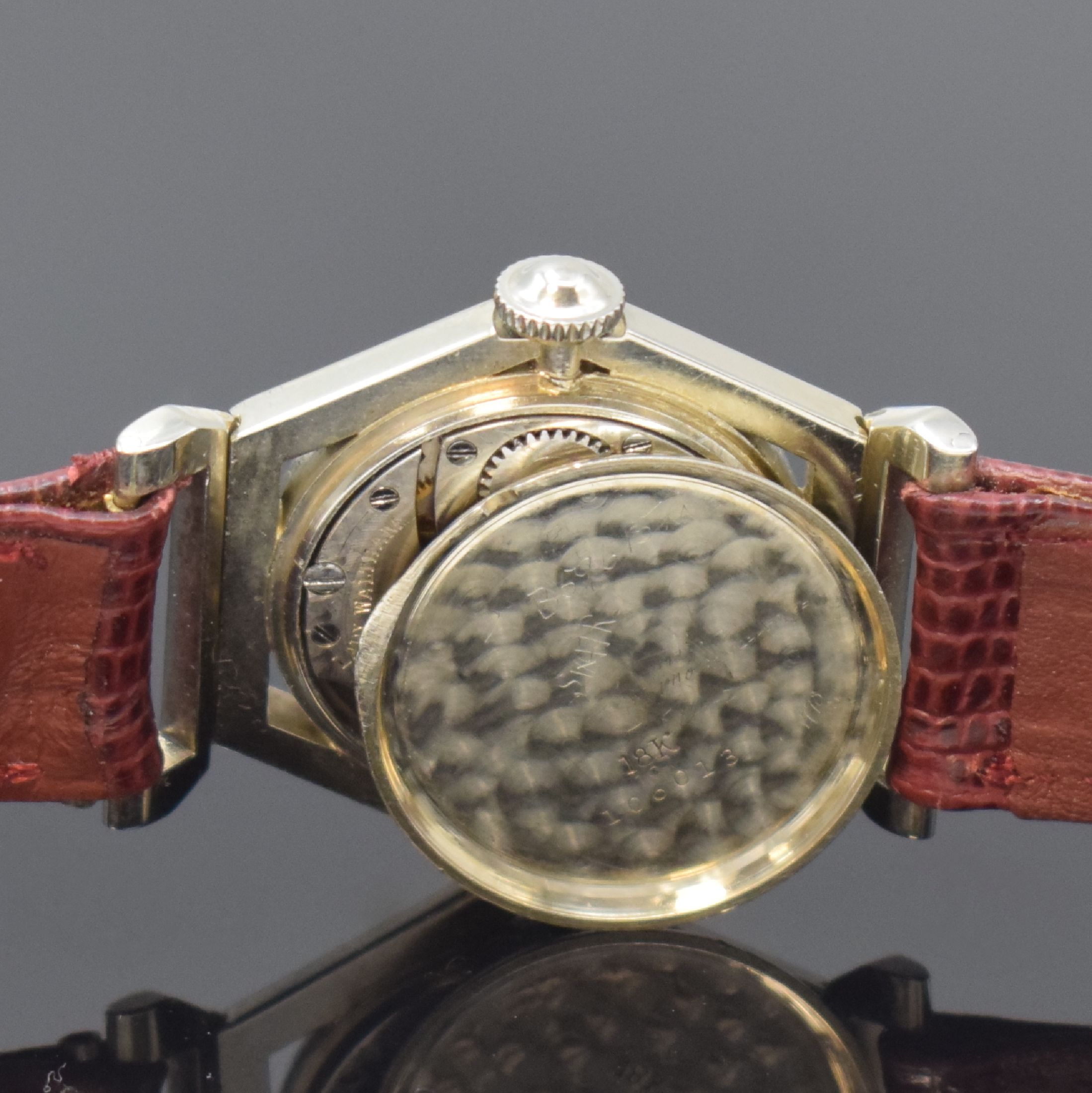 Detail e: WALTHAM seltene 6-eckige Armbanduhr in WG 750/000, USA um 1930, 3-tlg. Geh., ausgestellte bewegl. Anstöße, Monogramm-Grav. auf aufgedr. Boden, ...