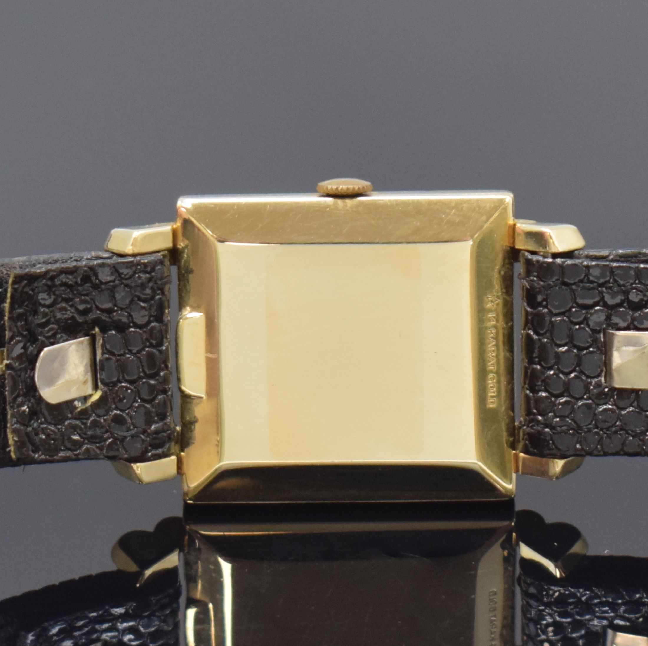 Detail b: WITTNAUER rechteckige Armbanduhr in GG 585/000, USA / Schweiz um 1955, Handaufzug, 2-tlg. Geh., Boden aufgedr., Lunette m. grav. Std.-Indizes, ...